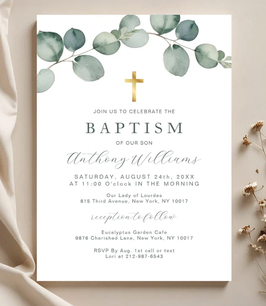 Modern baptism invitation with eucalyptus greenery across the top and elegant gold cross detail.