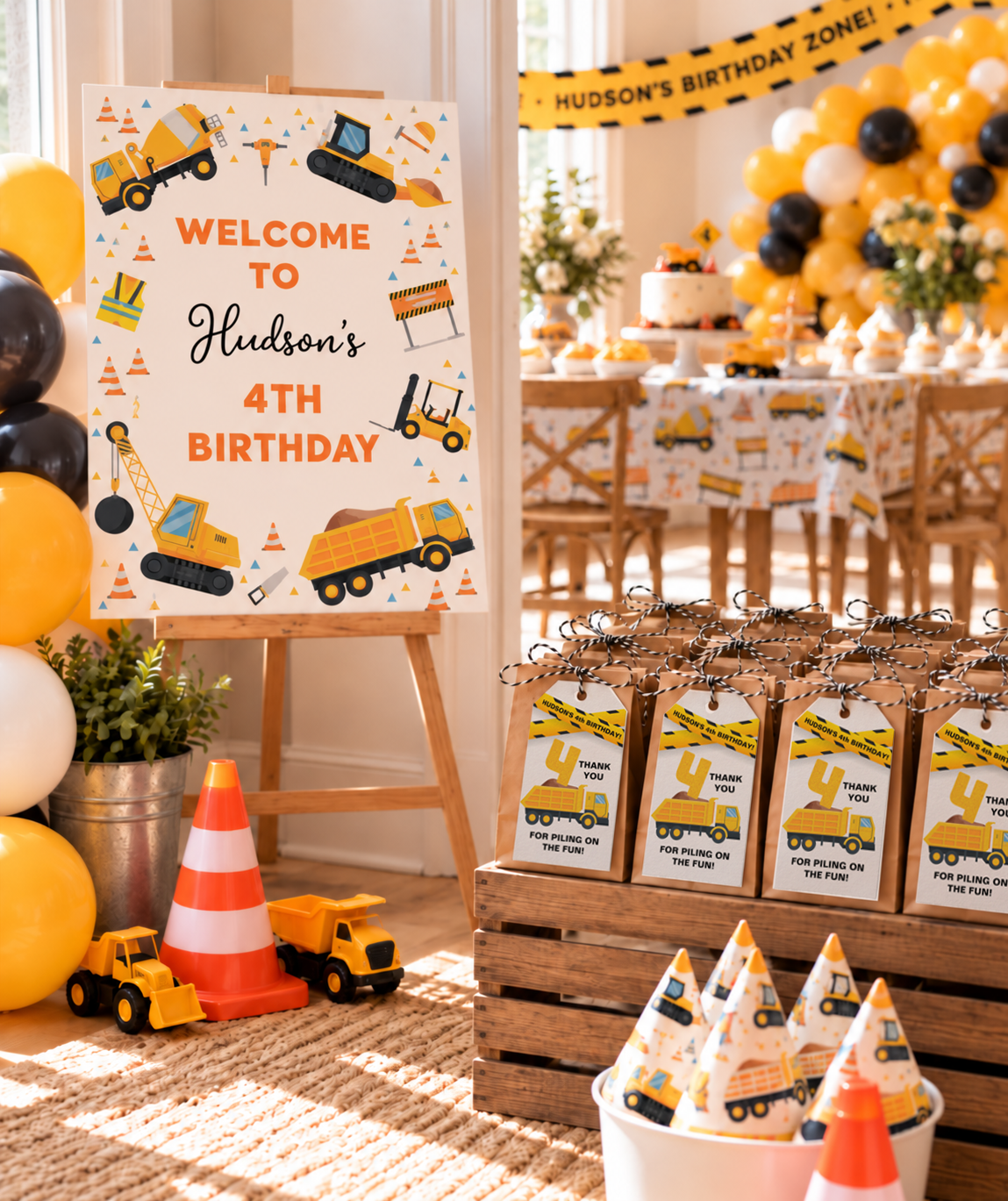 Construction birthday party entrance with personalized 4th birthday welcome sign, construction party hats, toy trucks, traffic cone, balloons, and favor bags with matching tags.