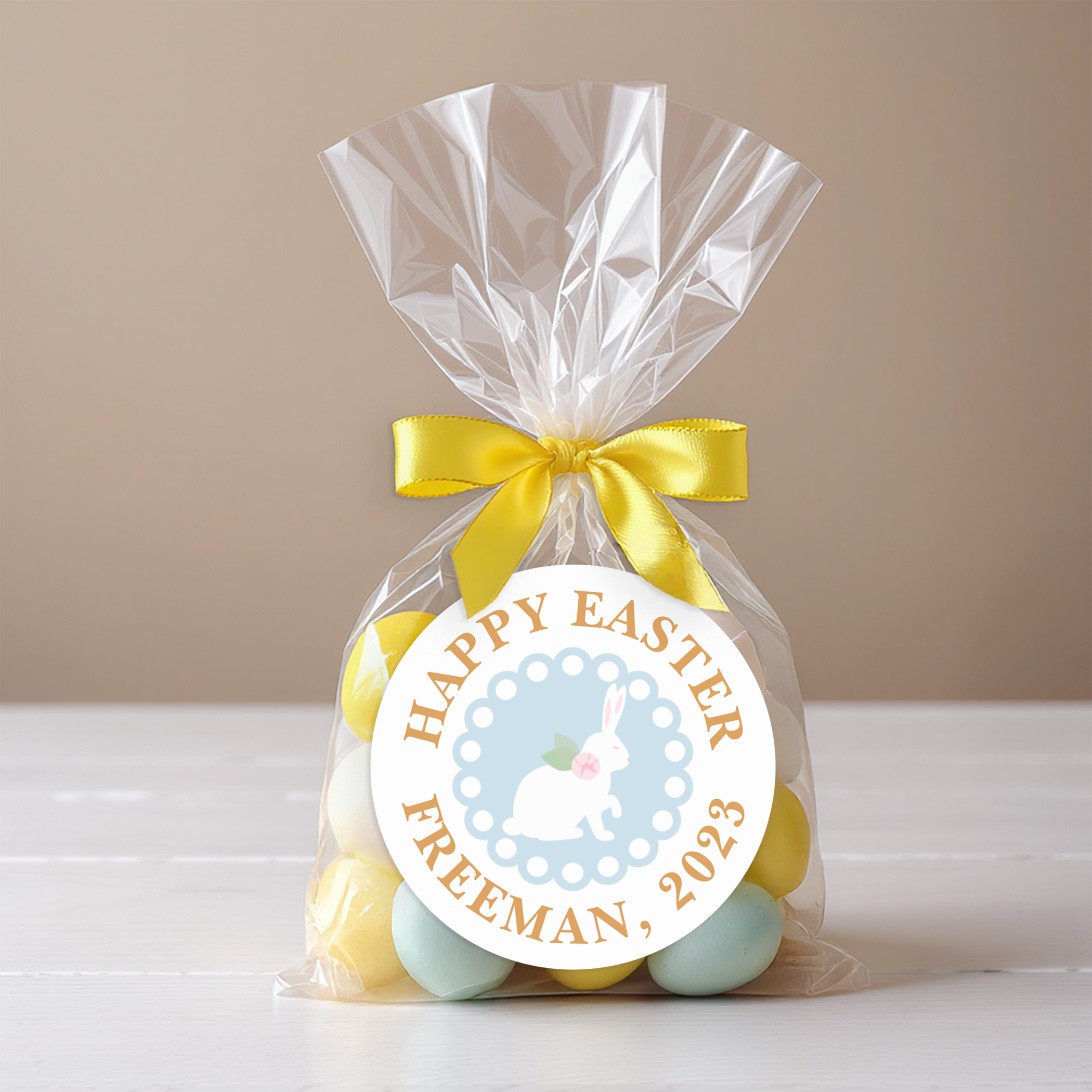 Round Happy Easter bunny sticker personalized with family name and year.