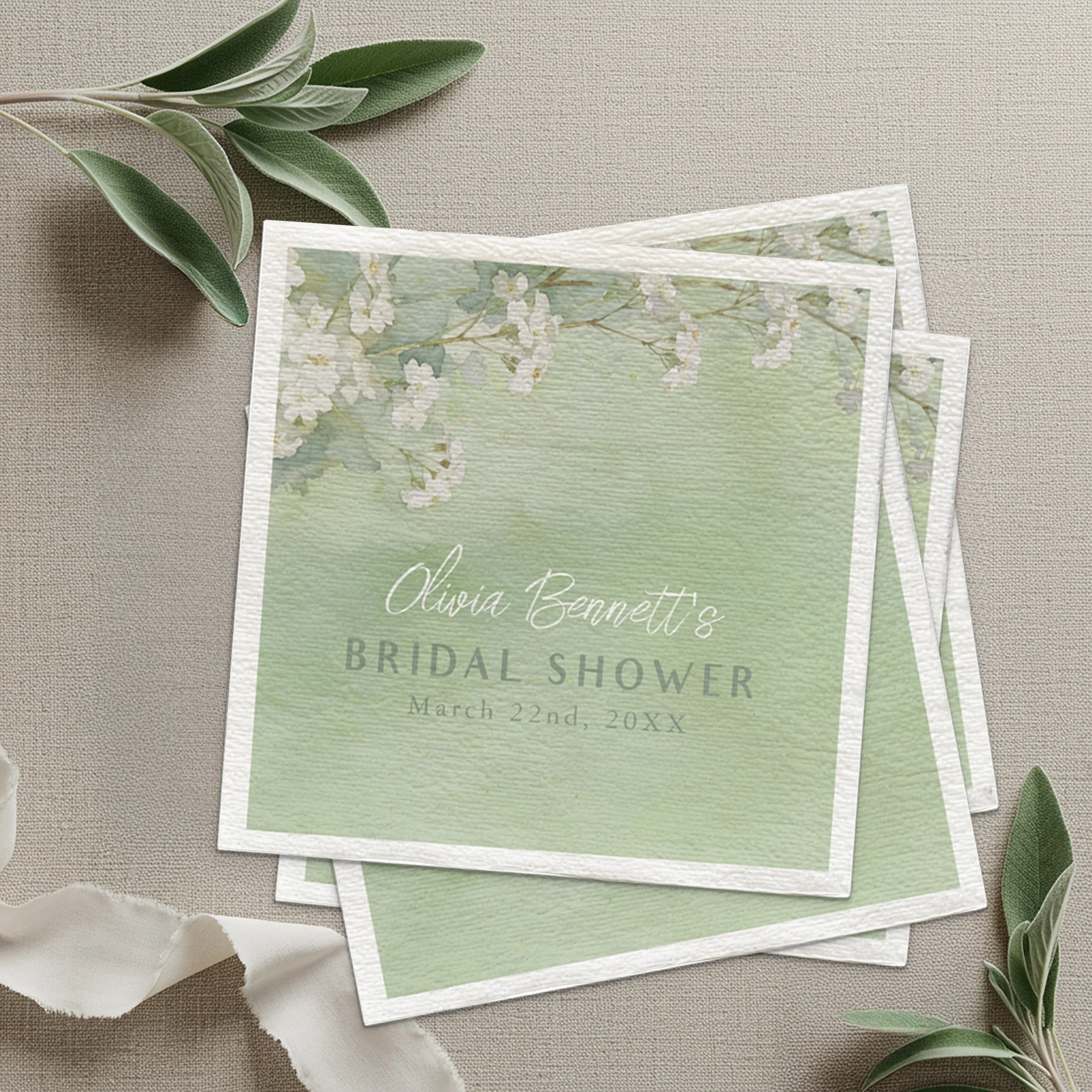Personalized sage green bridal shower napkins with watercolor floral design from the Love is in Bloom collection.
