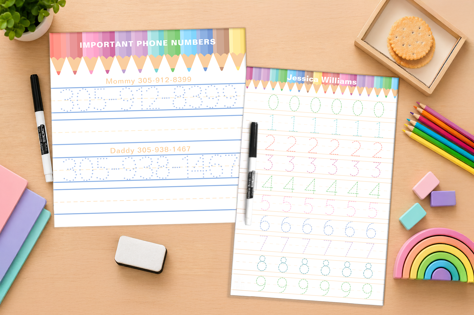 Two personalized dry erase learning boards on a wooden desk, one featuring number tracing practice from 0 to 9 and one showing important family phone numbers with dotted tracing lines, surrounded by pencils, erasers, and rainbow toys.
