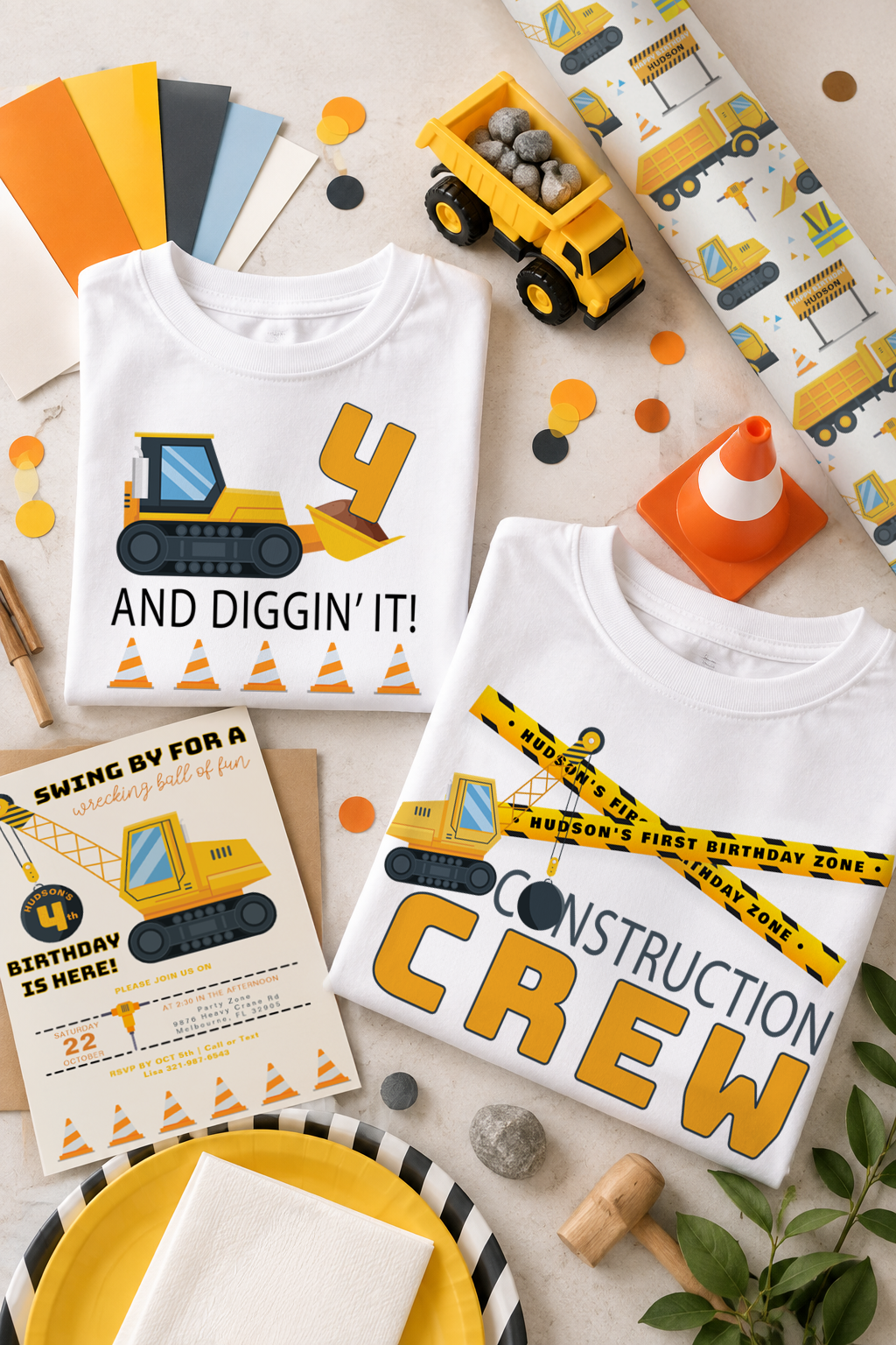 Construction birthday party color palette flat lay with matching birthday shirts for dad and child, construction invitation, yellow and black tableware, toy dump truck, traffic cone, and construction-themed tablecloth.