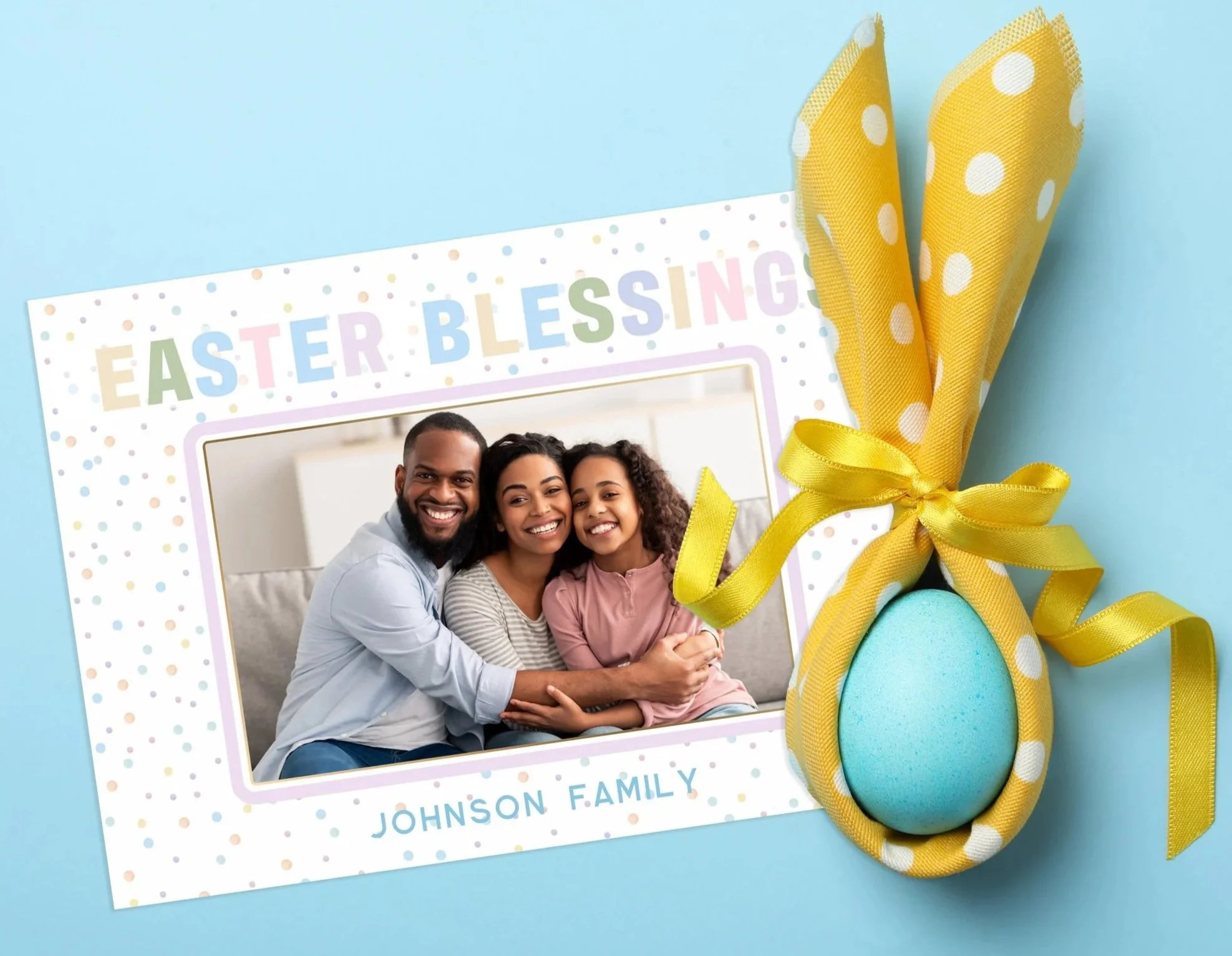 Pastel Easter family photo card with soft spring colors and Easter egg accents.