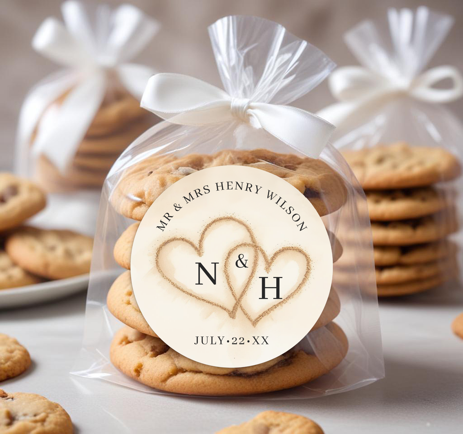 Round beach wedding favor sticker on cookie packaging with sand heart design