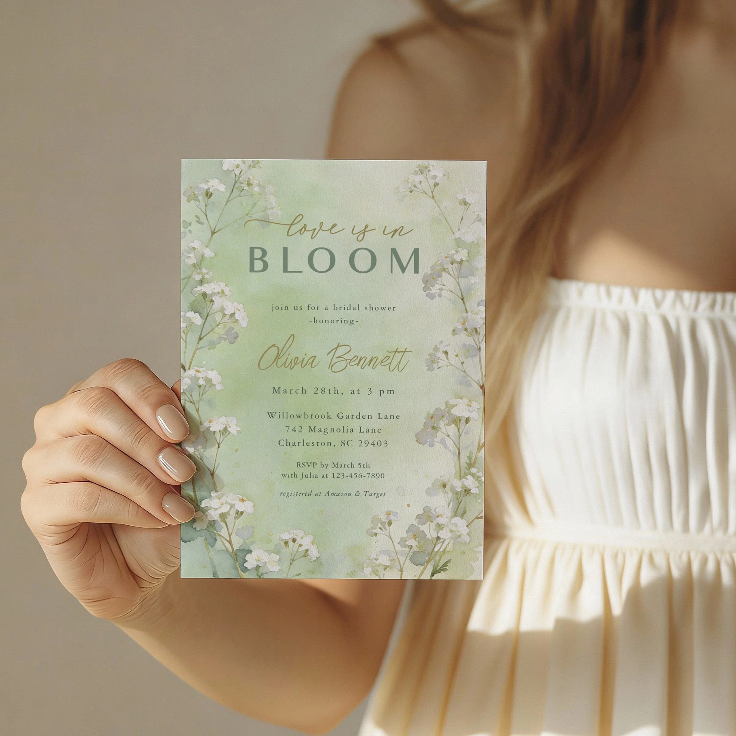 Love is in Bloom romantic garden bridal shower invitation featuring soft green watercolor florals and elegant typography.