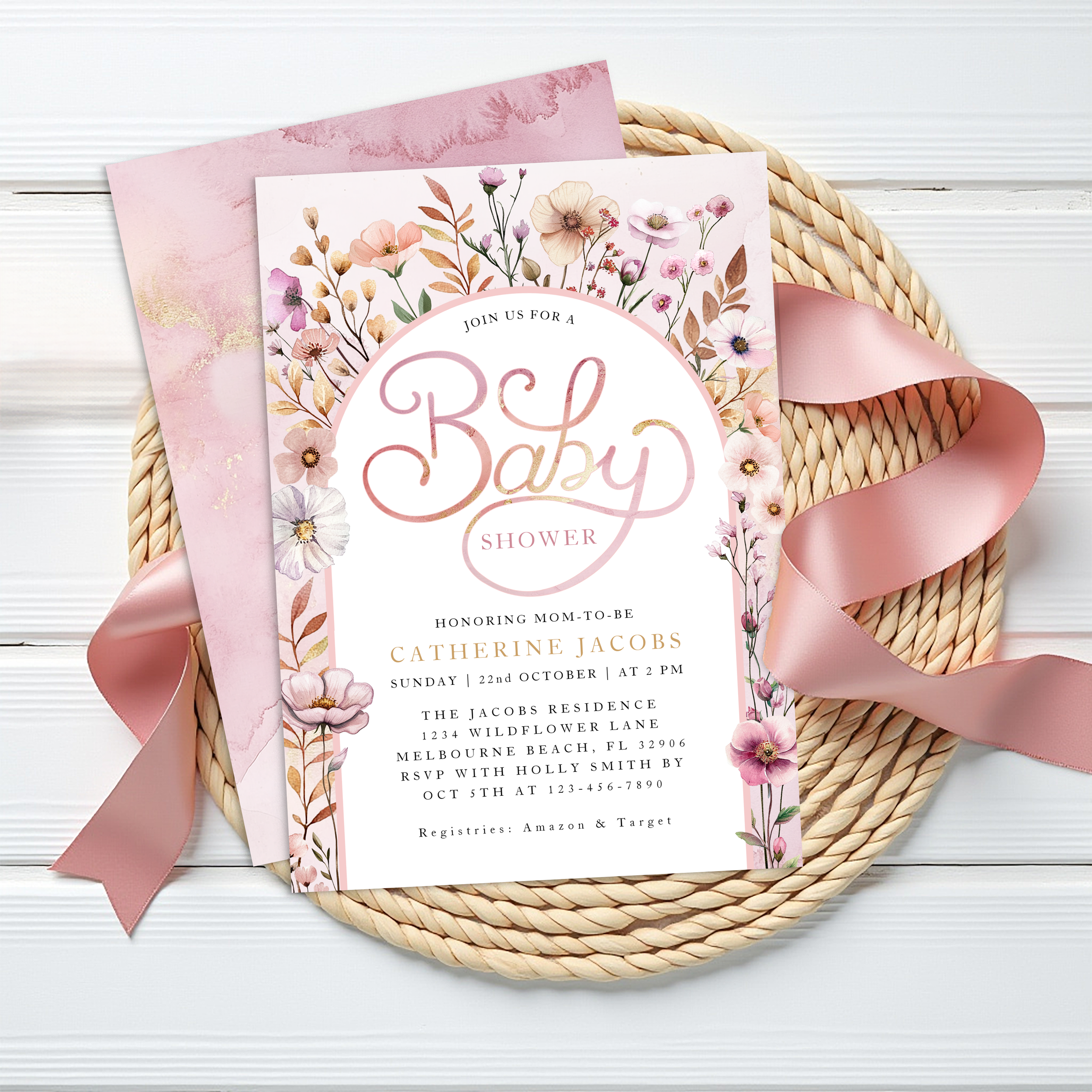 Dusty pink wildflower baby shower invitation with watercolor florals and elegant “Baby” script typography.