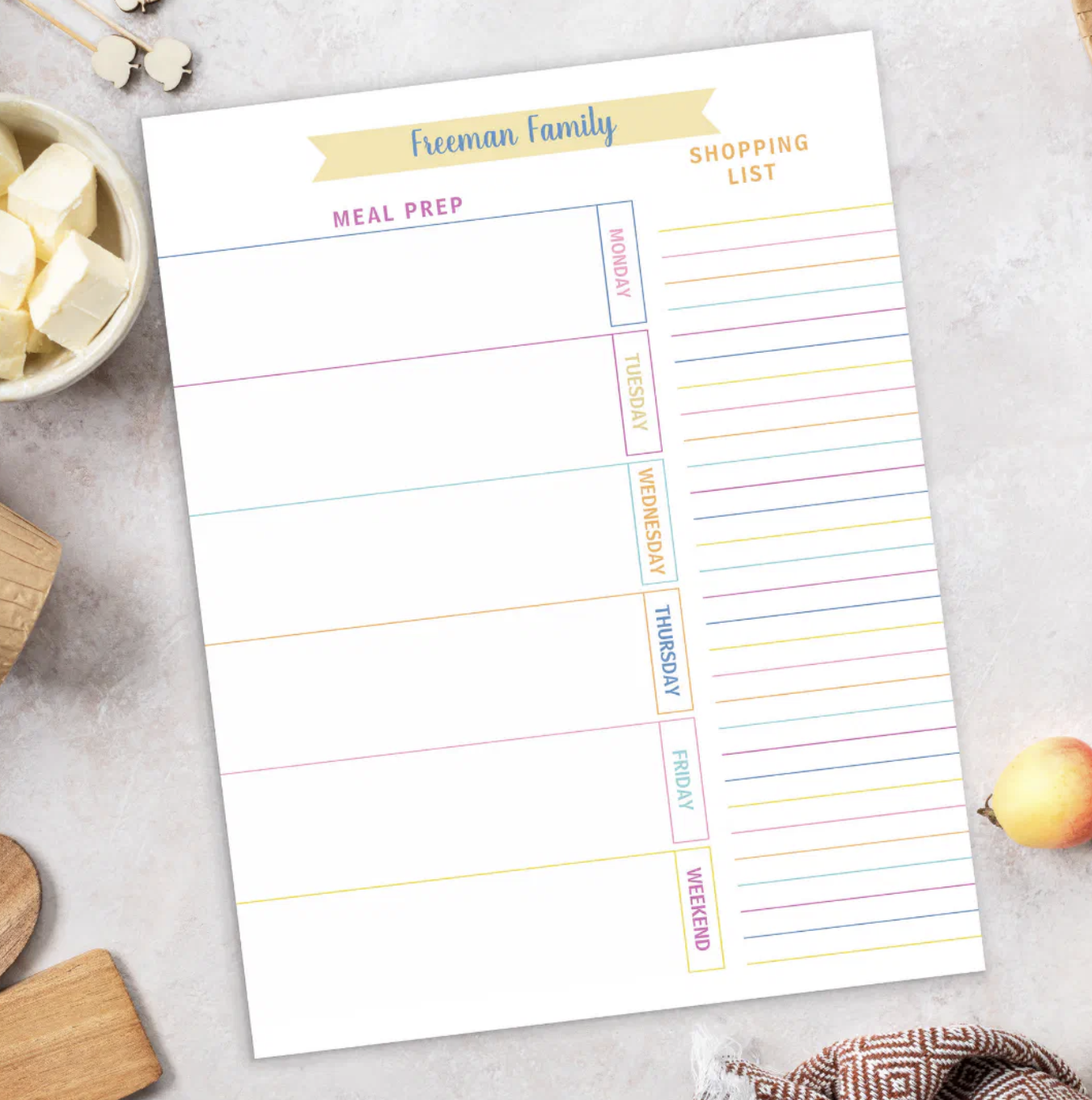 Colorful family meal planner with sections for each day and organized grocery list columns.