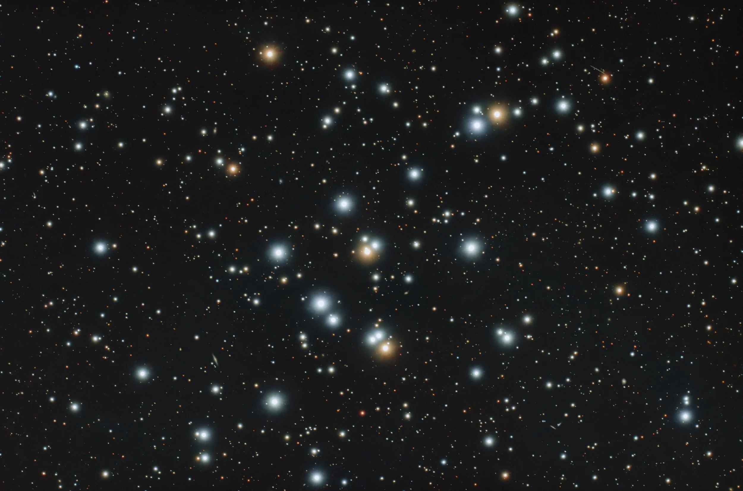 A view of outer space showing numerous stars with different brightness levels scattered across a dark background.