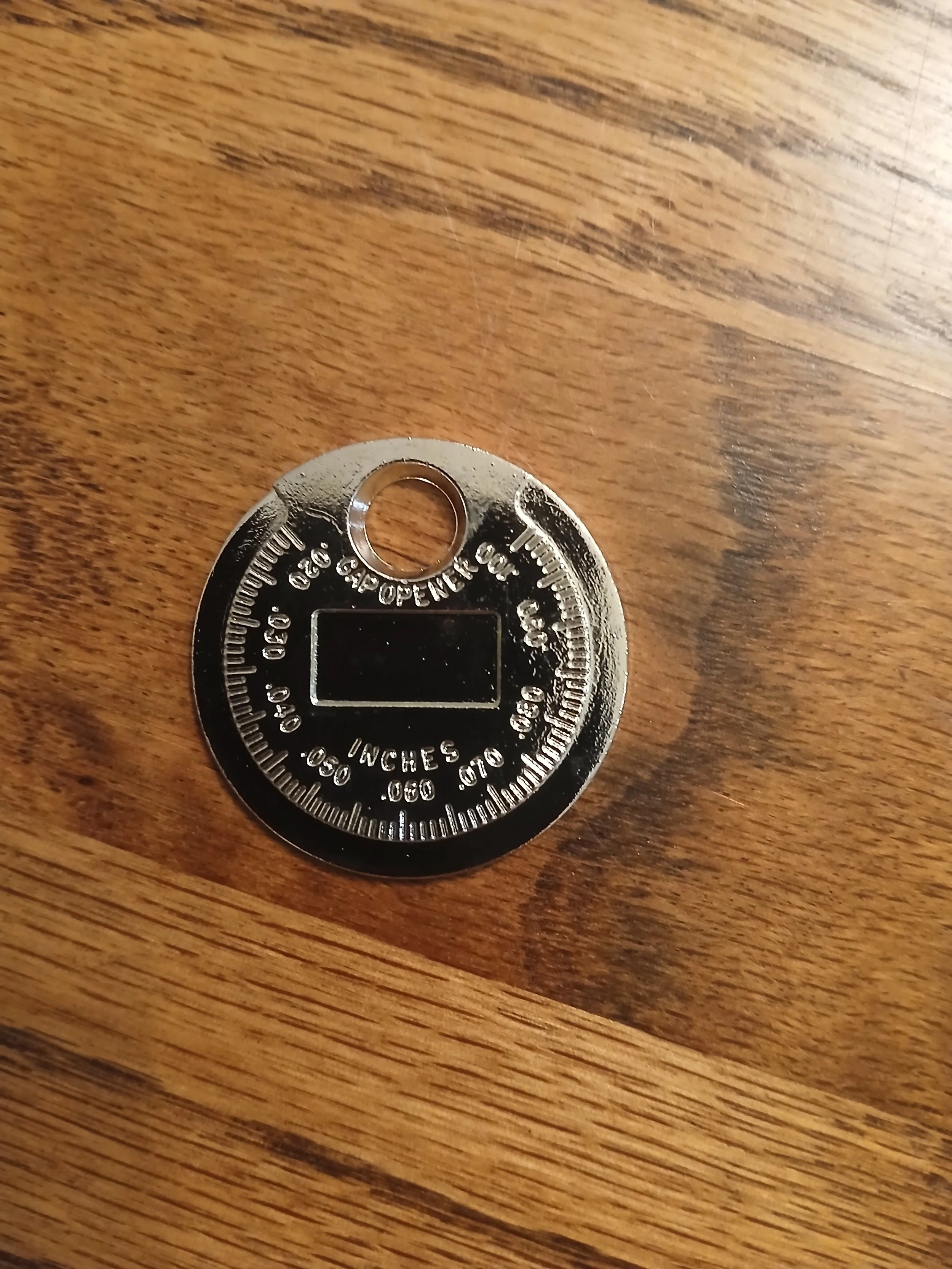 Spark plug gapping tool