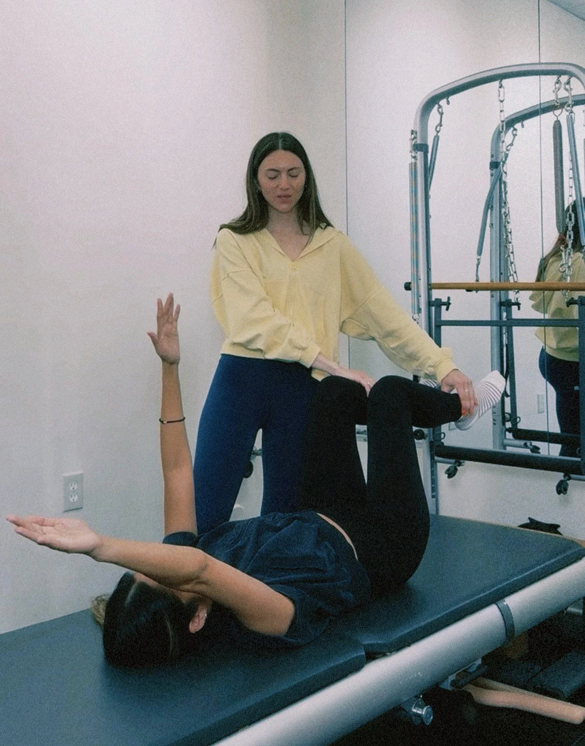 olivia giving a private session at strata pilates
