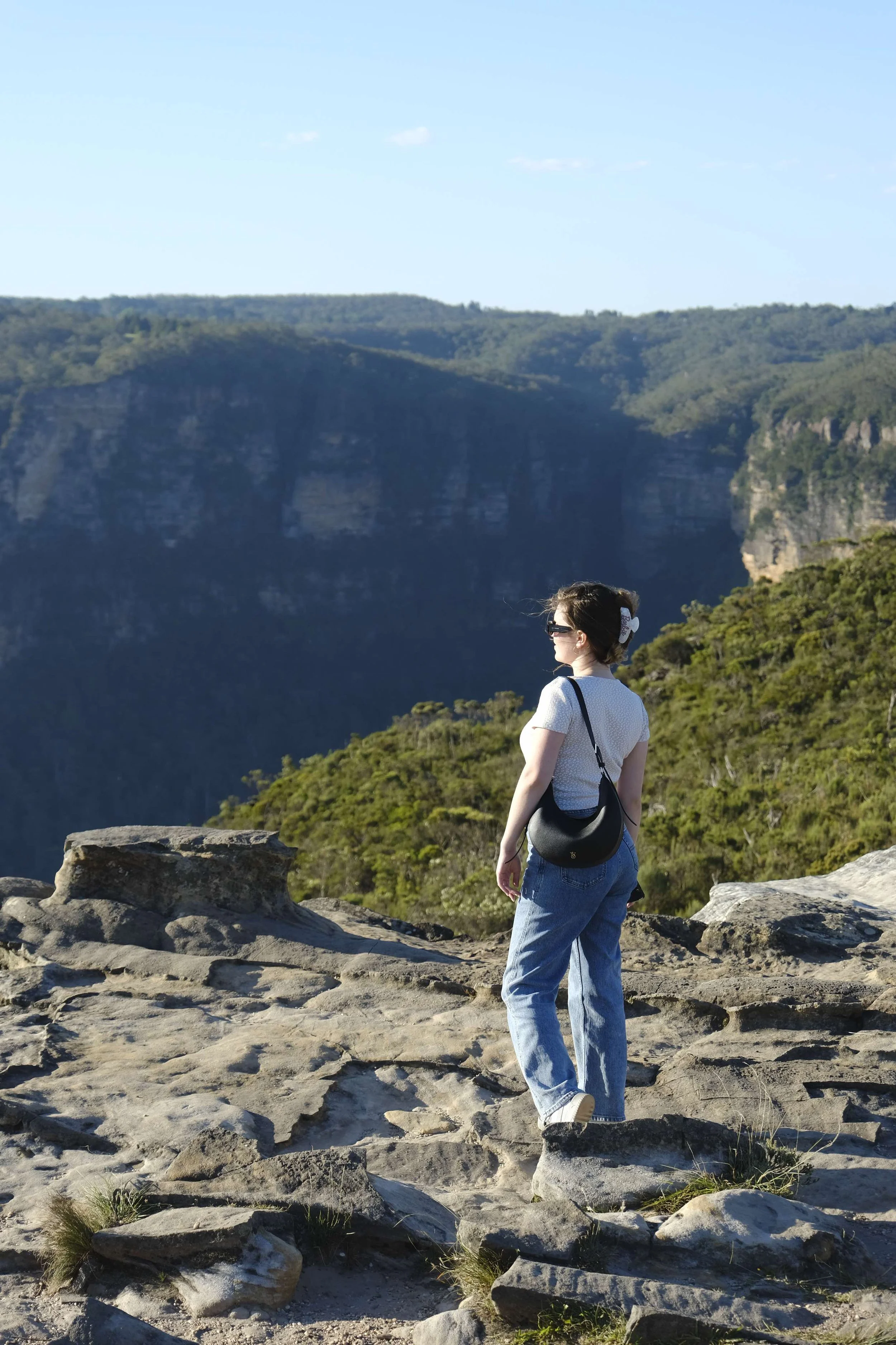 Girl standing on mountain
