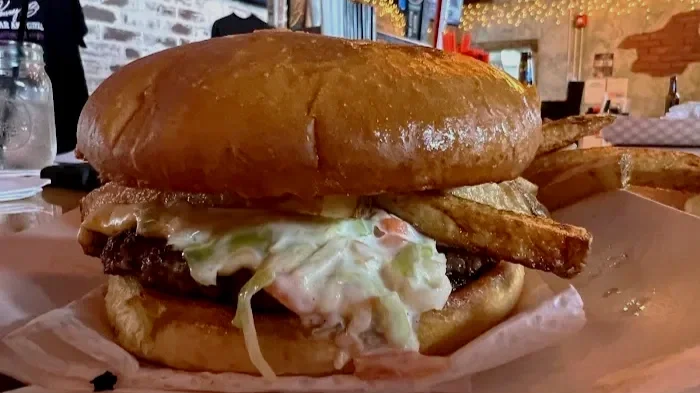 smash burger with coleslaw and fries
