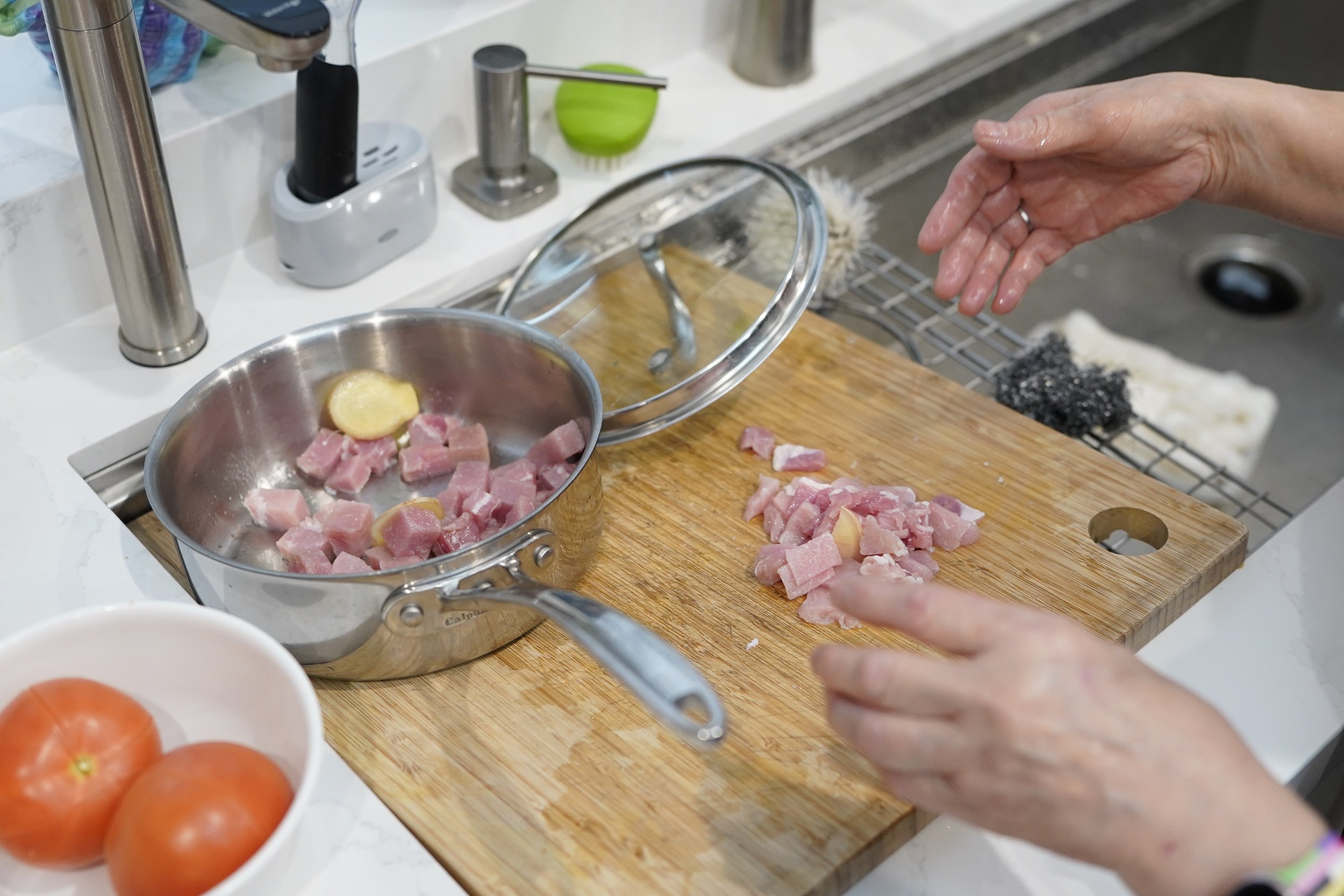 Agong & Apu cooking in the kitchen
