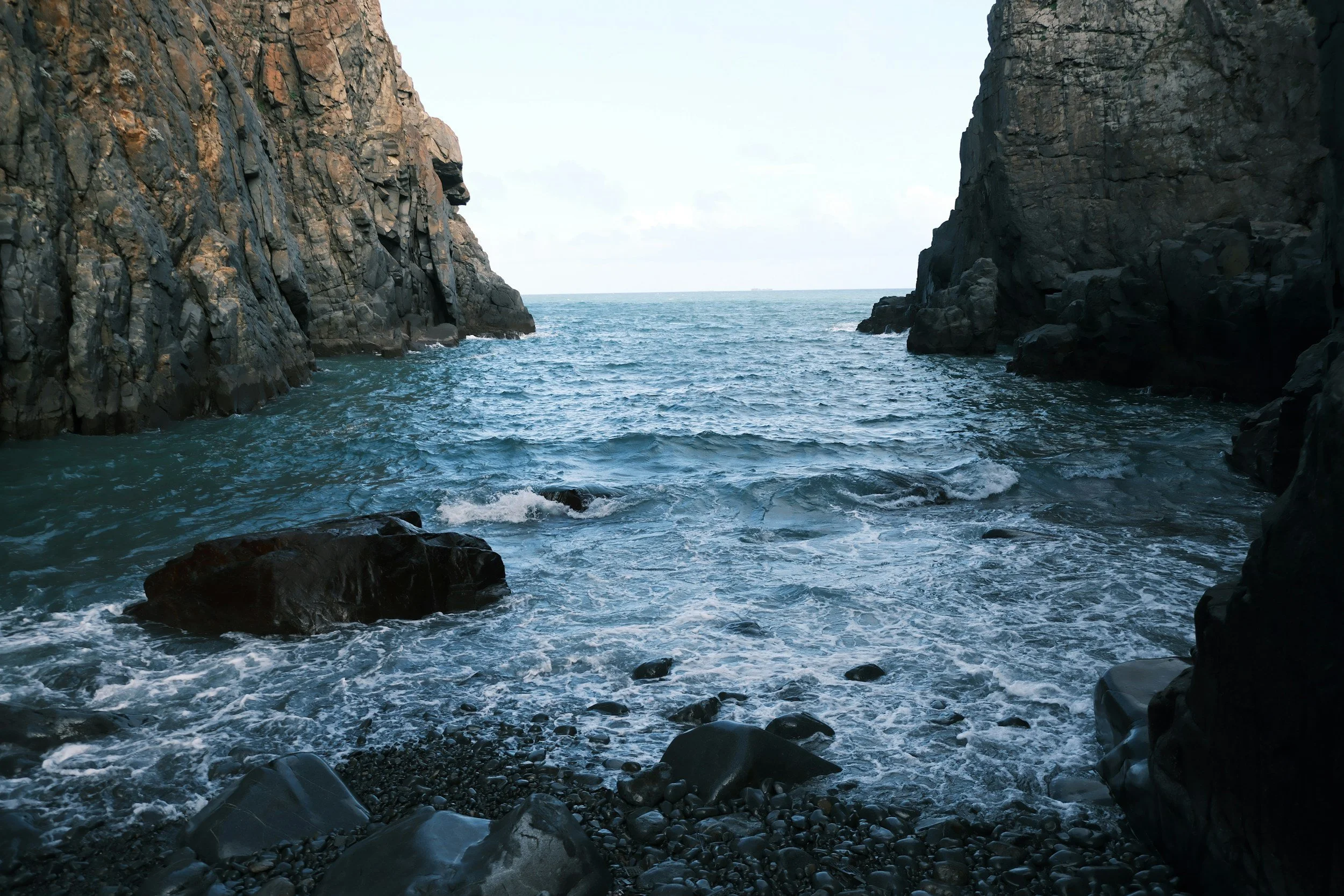 ocean between rocks