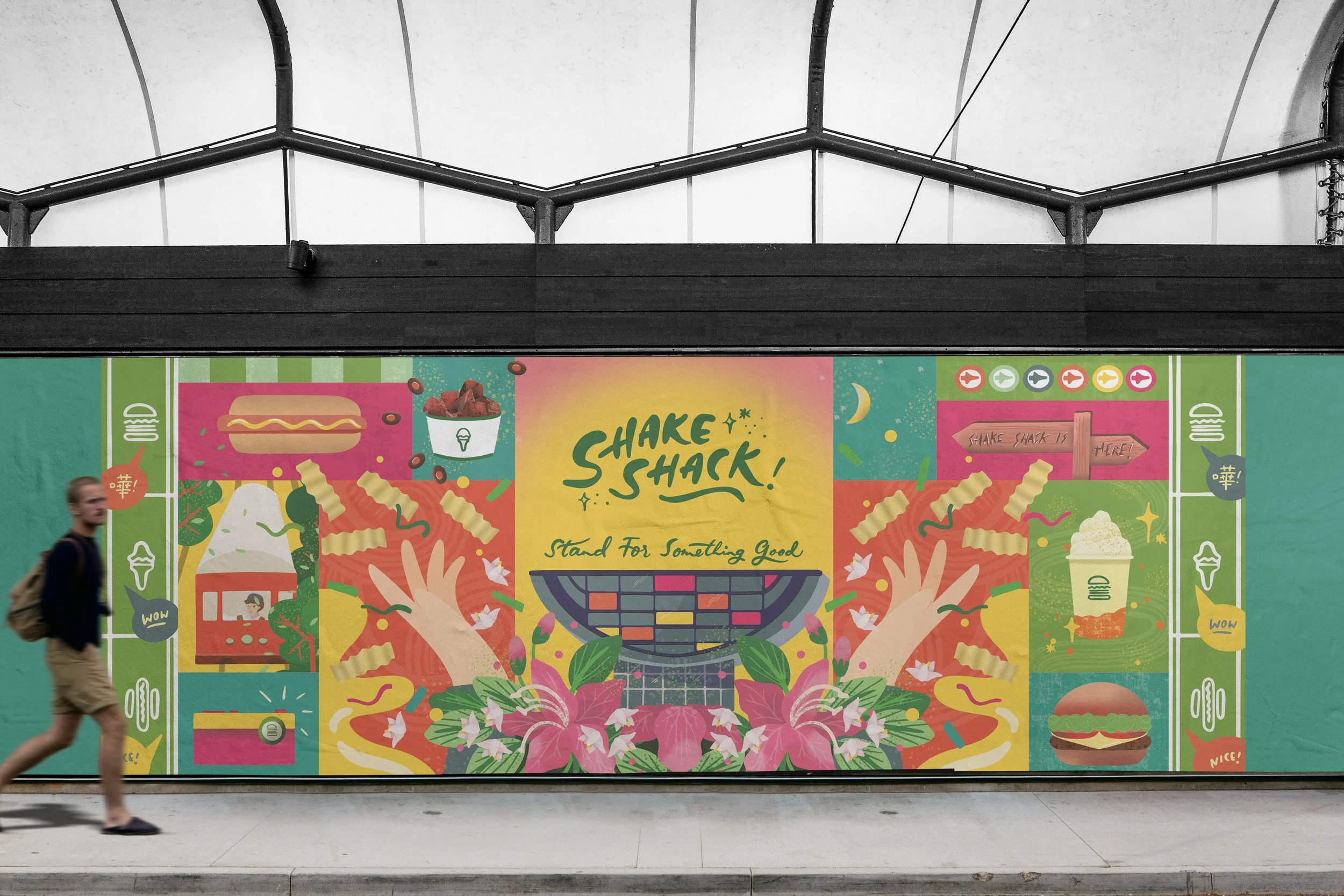 Colorful advertisement mural for Shake Shack featuring illustrations of a burger, fries, a soft serve ice cream, a burger, flowers, hands, and various decorative elements with the text "Shake Shack" and "Stand For Something Good."