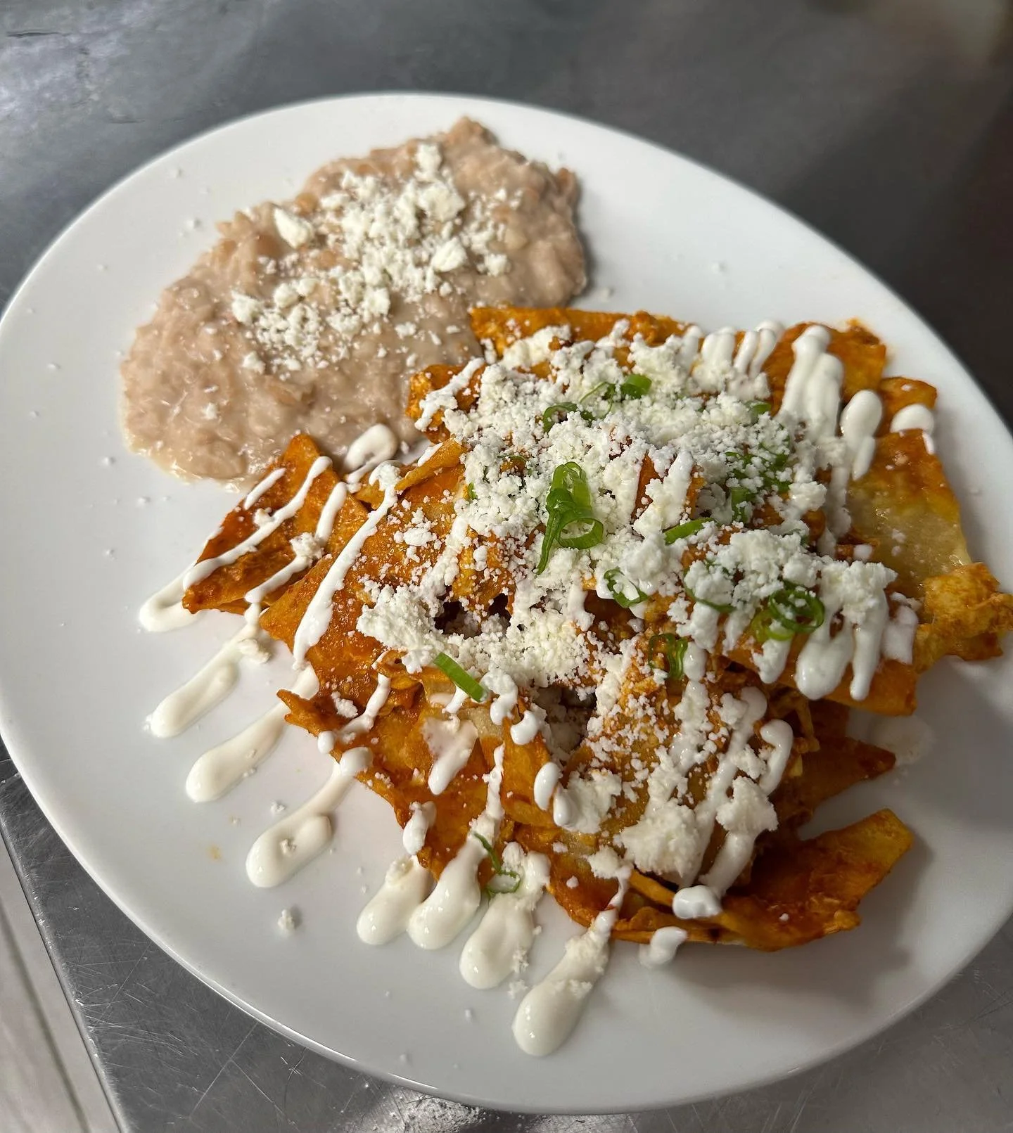 🌟 Discover the taste of true authenticity at the Neighborhood Cafe! Our homemade chilaquiles are a flavor explosion waiting to happen. 😋

🍅🧀 Crafted with care, our homemade sauce brings the perfect blend of flavors, and the addition of fresh ques