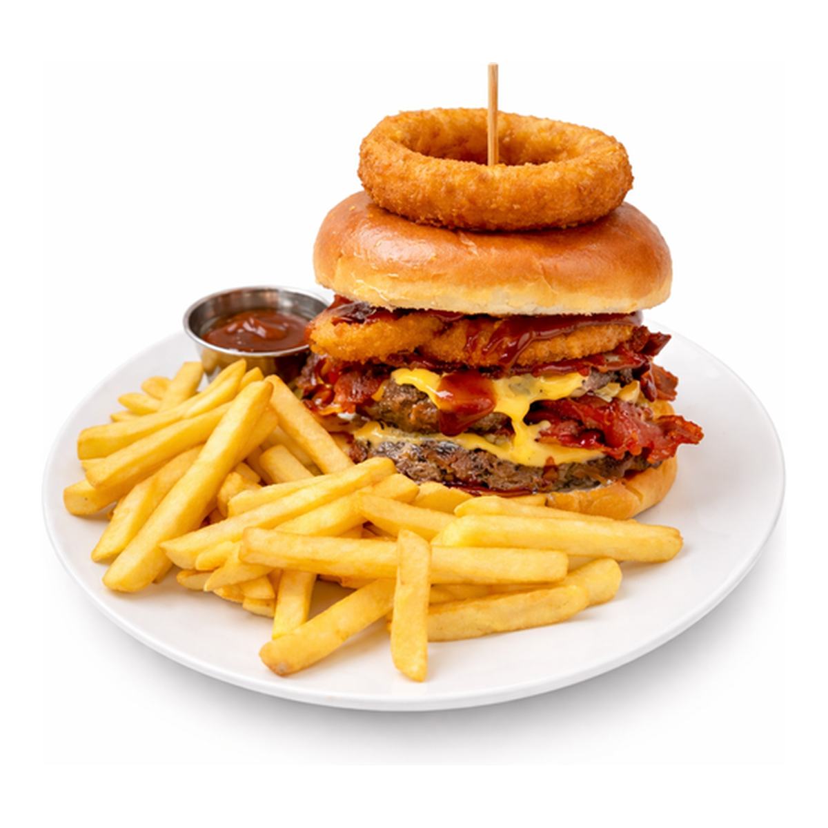 BBQ bacon cheeseburger topped with onion rings and served with fries