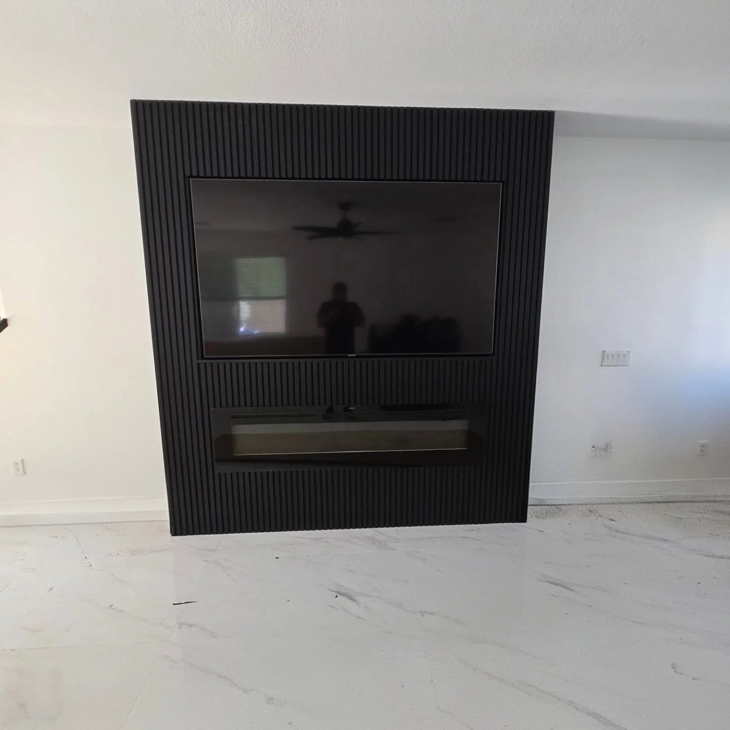 Client asked for a fire place with a TV above. Gave them there dream.