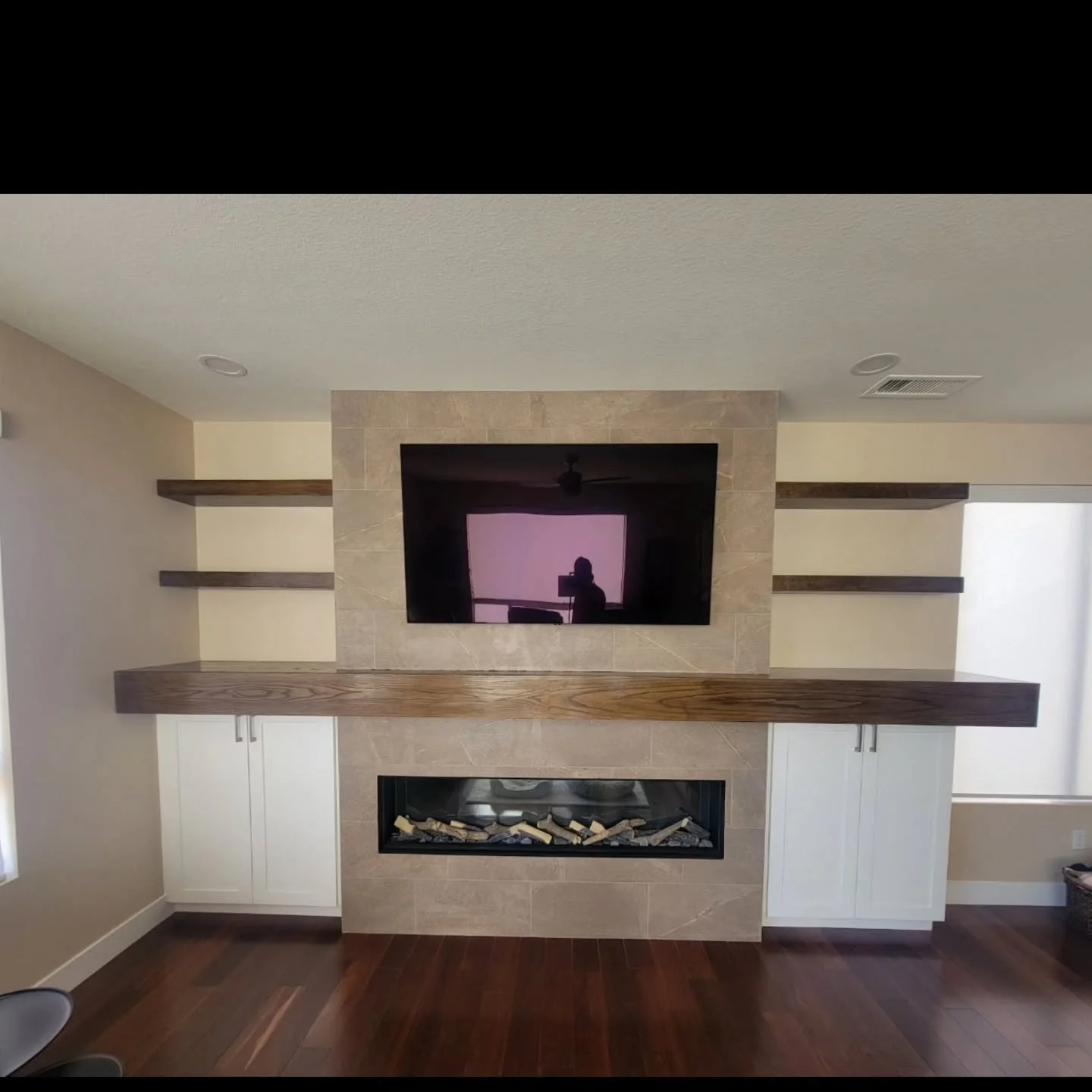 Really nice fireplace with the biggest mantel I've ever made.