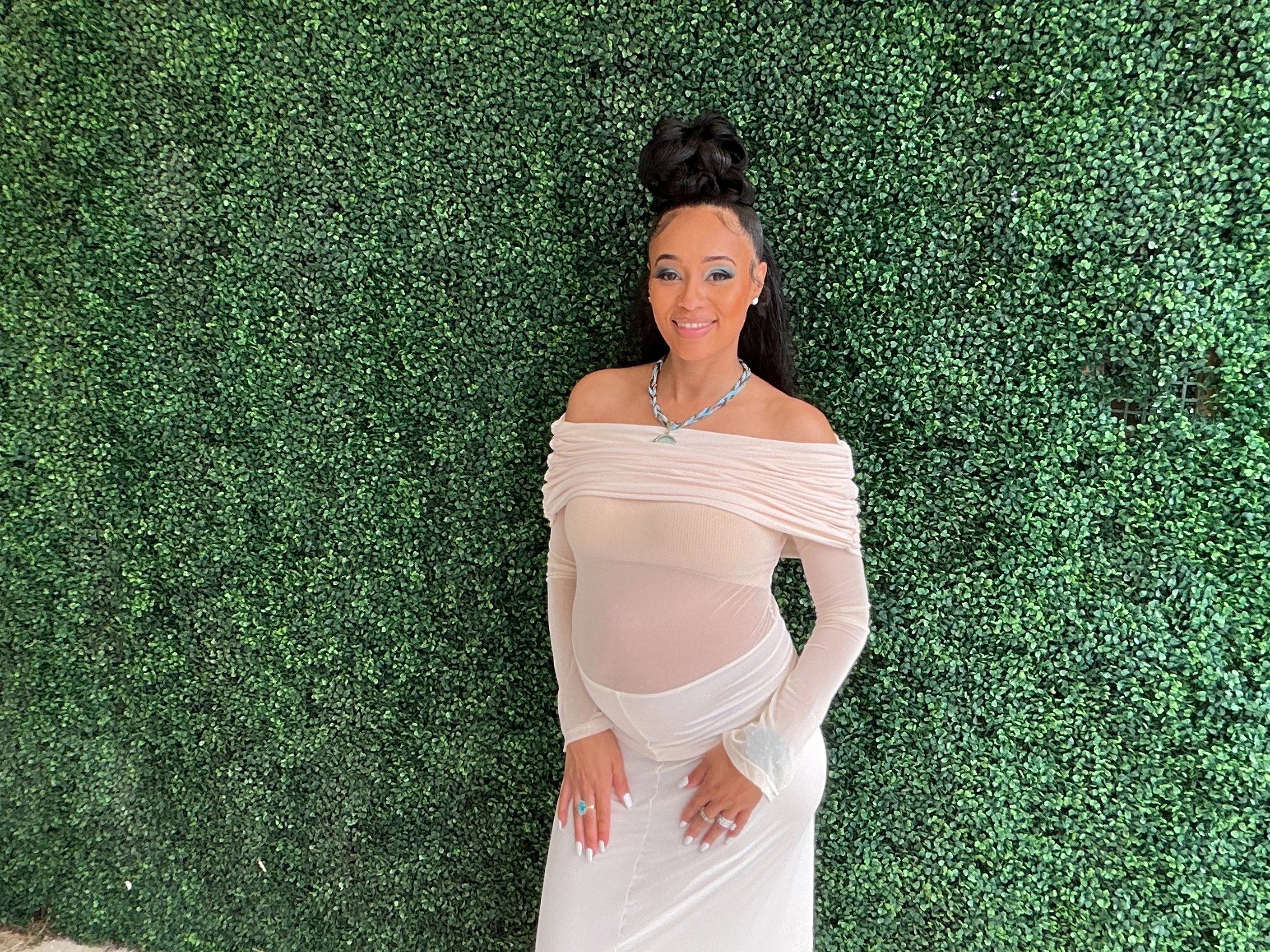 Baby shower grass wall backdrop rental at Grateful Palate Catering & Events in South Florida