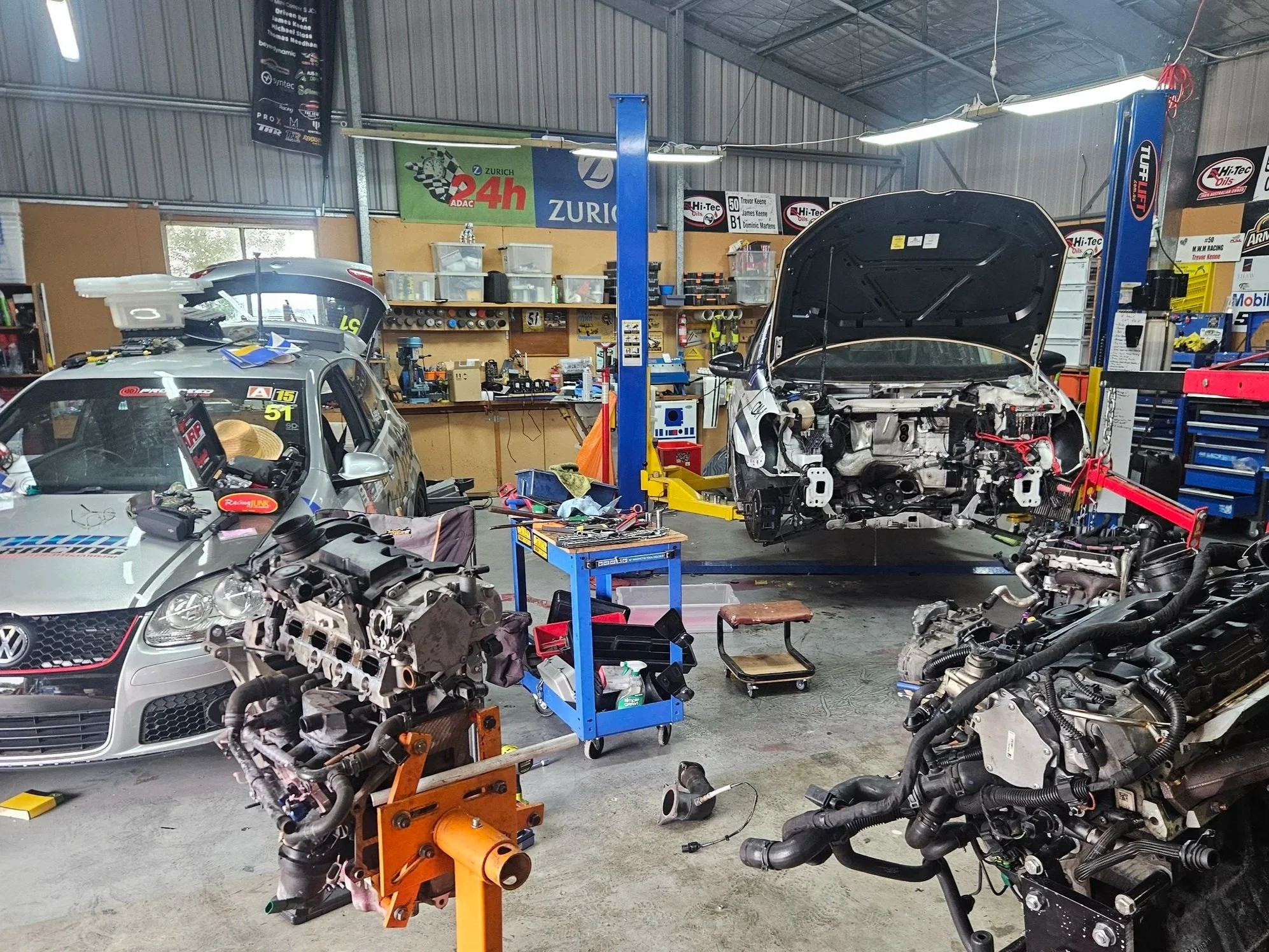 MWMRacings workshop, working on their Golf R racecar and MK5 GTI Tarmac rally car.