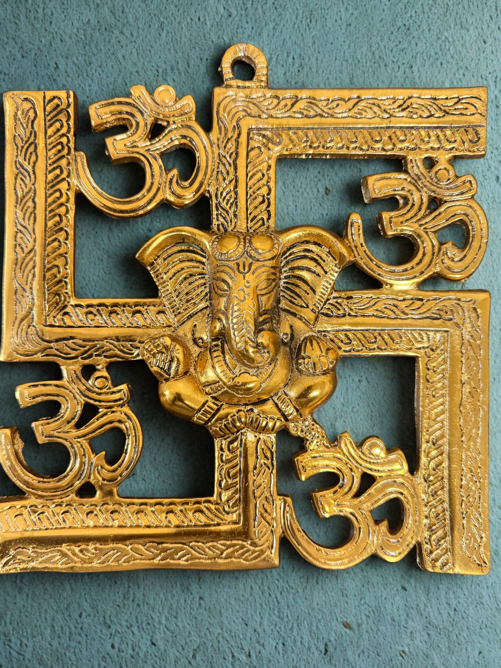 Metal Swastik Ganesha Sculpture