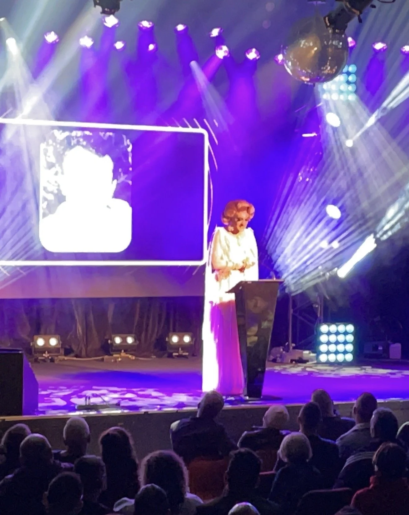 Minnie Cooper speaking at Mardi Gras event “My Drag Story”