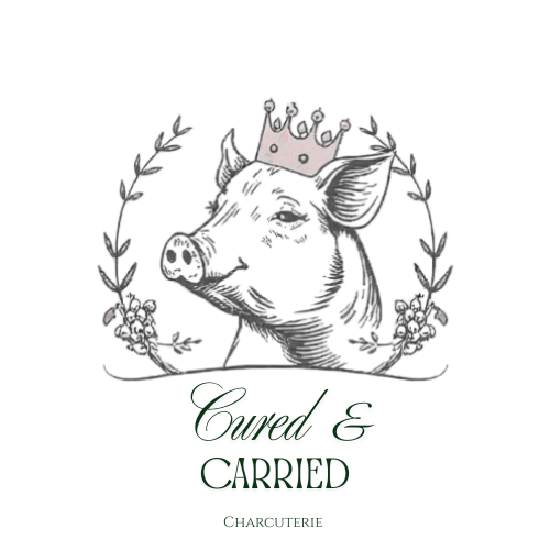 Illustration of a pig with a crown on its head, surrounded by floral wreath, with the text 'Cured & Carried Charcuterie' underneath.