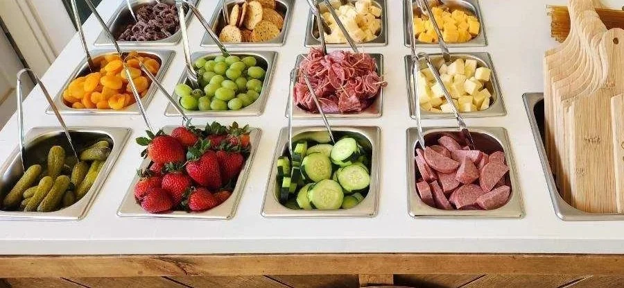 Mobile charcuterie cart, cheese, vegetables, meats, fruits