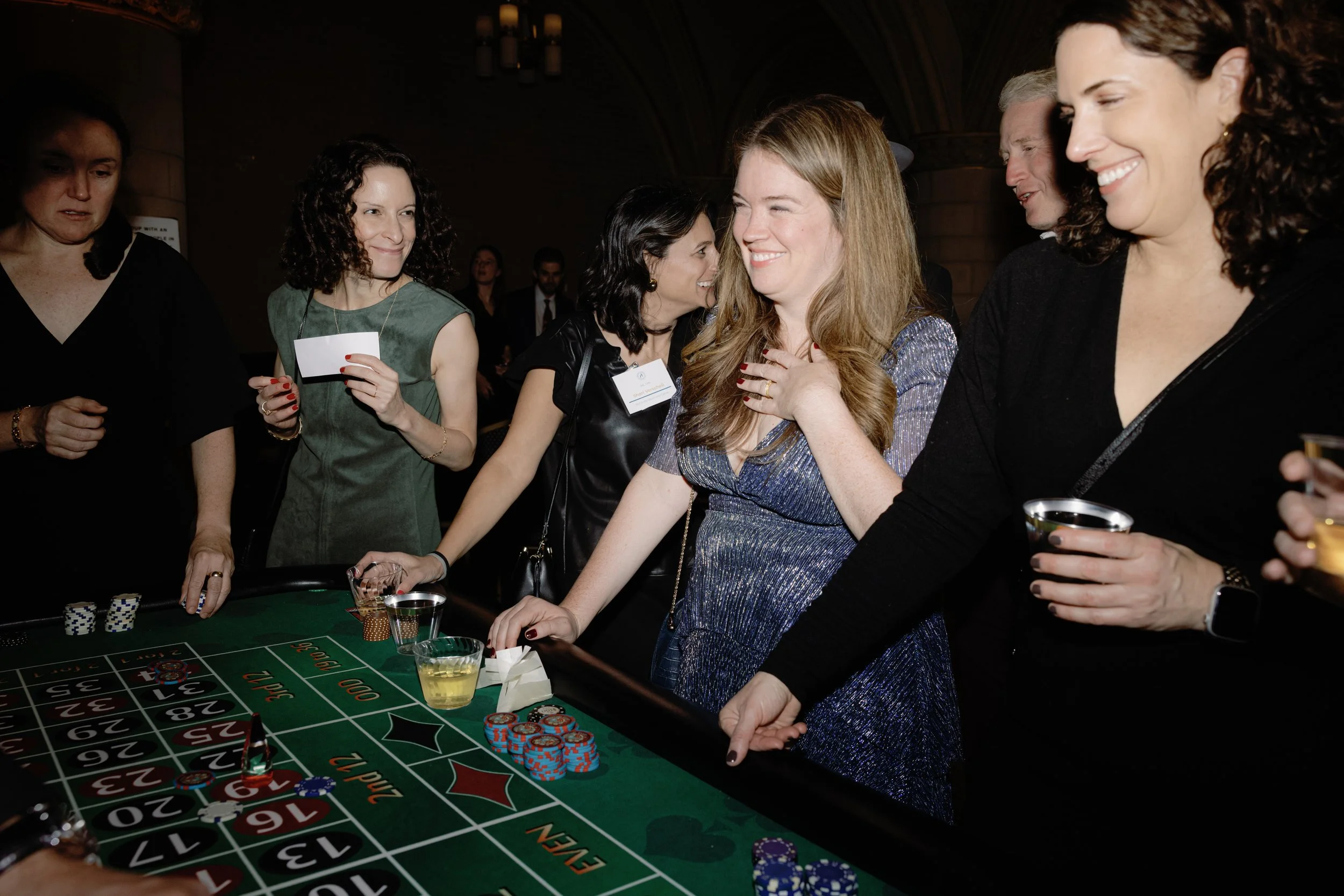 Guests celebrating together at Bigs & Littles NYC Casino Night