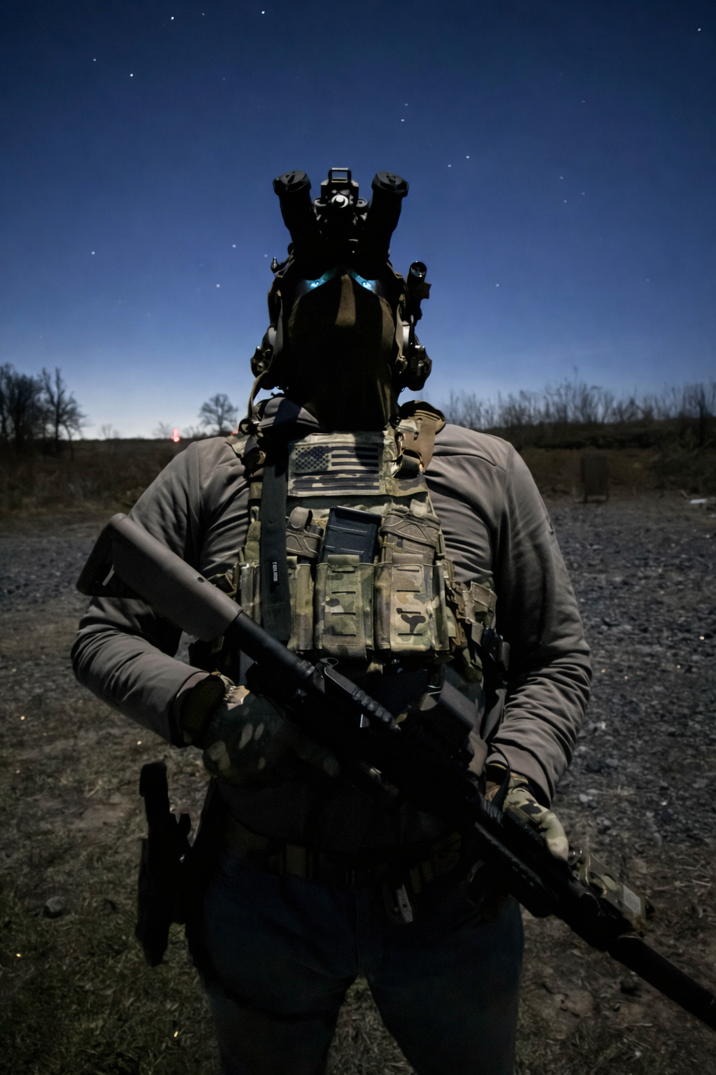 A person in tactical gear and a helmet with a night vision mount, holding a rifle, standing outdoors at night with a starry sky in the background.