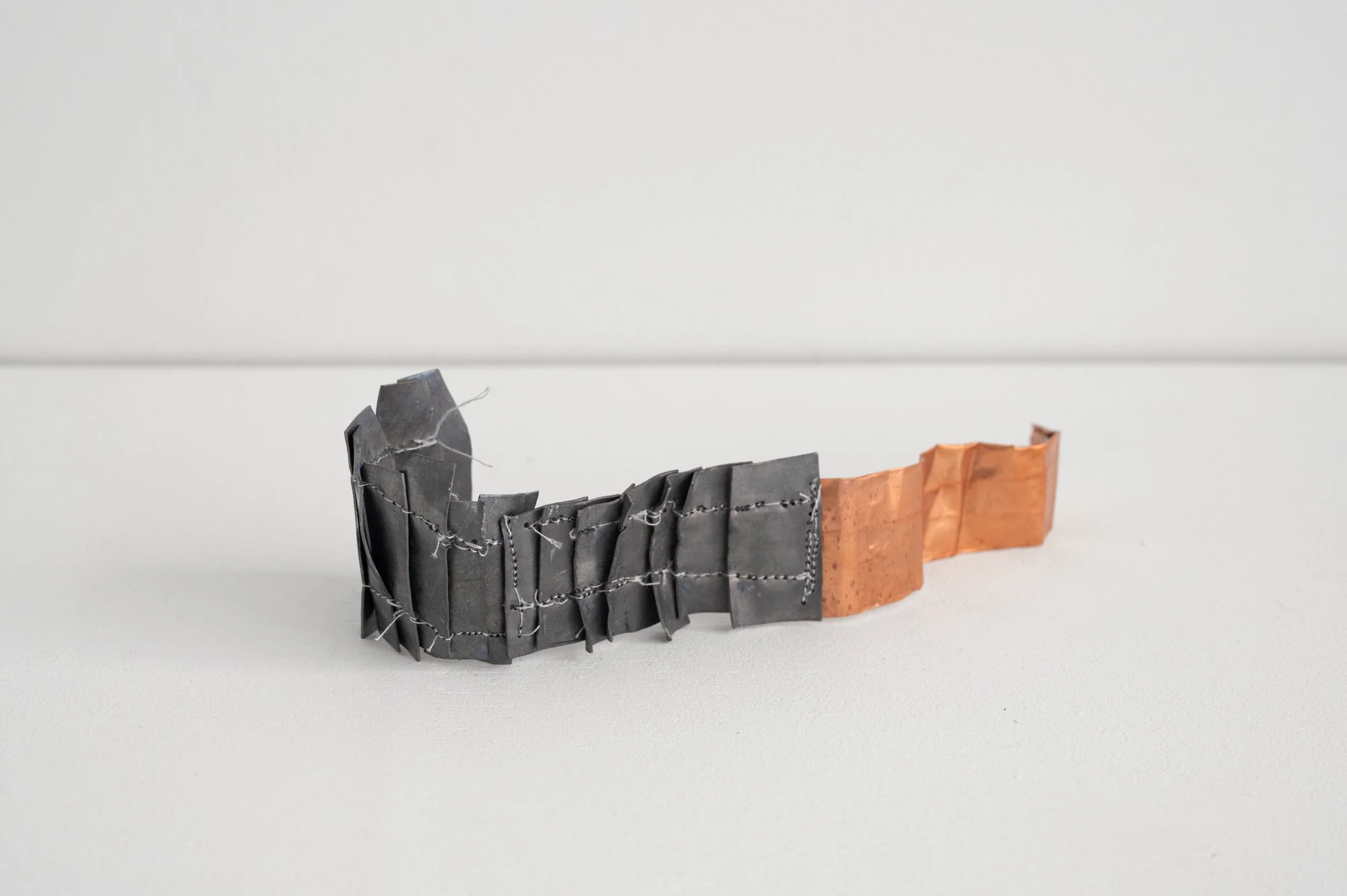 Stitched 2026 - 5 x 18 x 6 cm copper, lead & cotton 