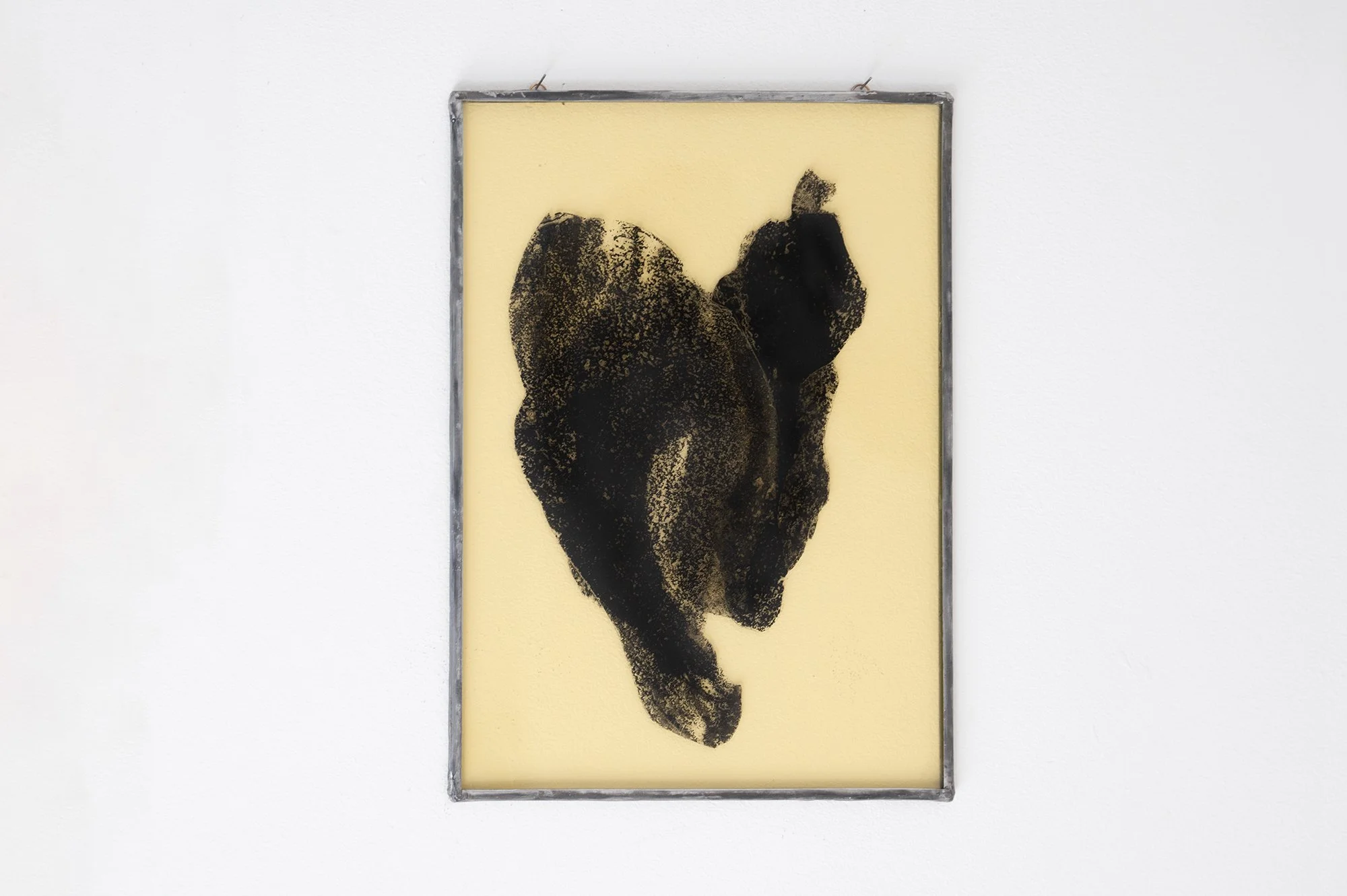 Overlay 2025 - 25.5 x 18 cm Carbon paper, ink, acrylic paint on glass, artist made aluminium frame