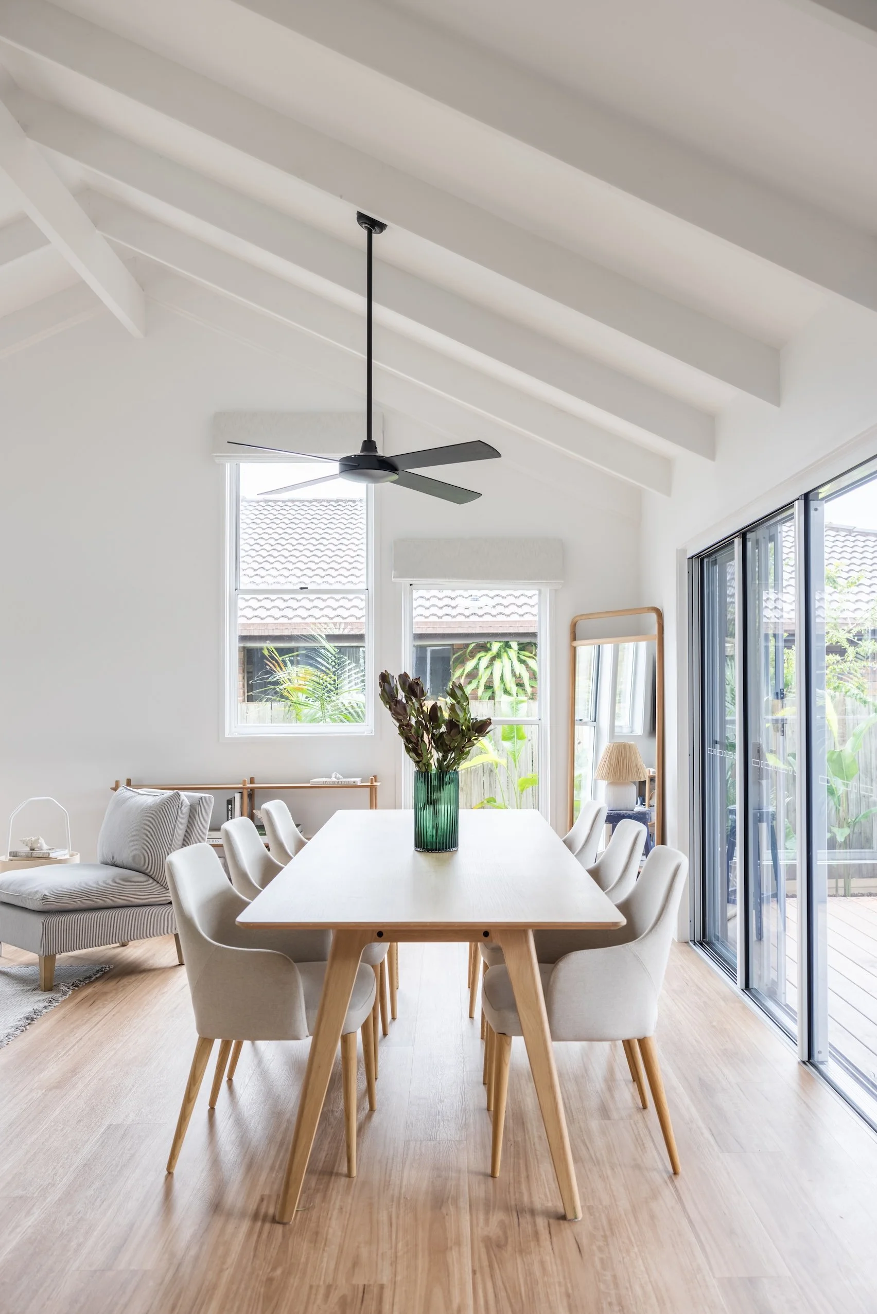 Open-plan dining and living area in a residential renovation