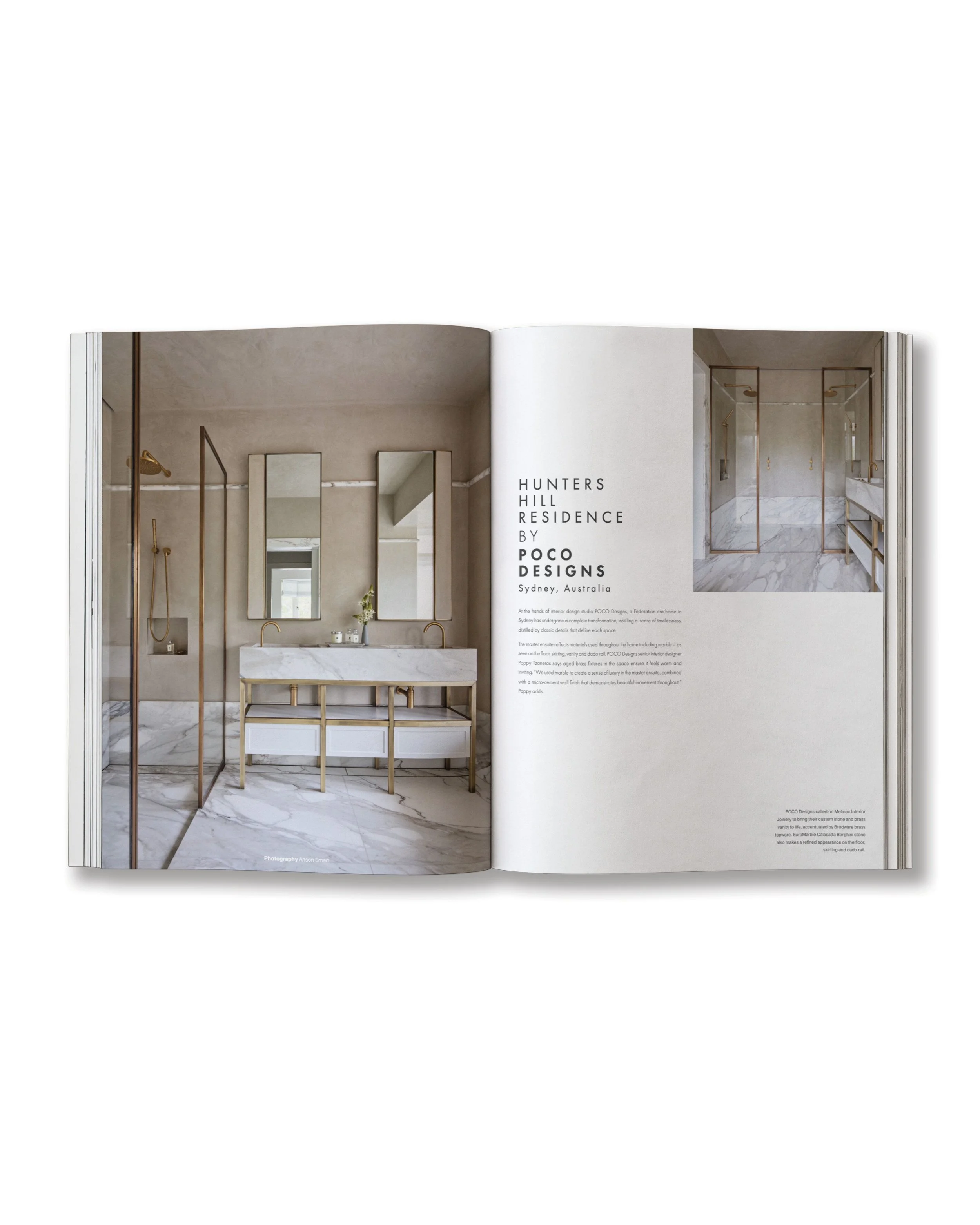 Two-page magazine spread featuring a modern bathroom with marble accents, a double sink vanity, and a glass-enclosed shower with brass fixtures, with text about Hunters Hill Residence by POCO Designs in Sydney, Australia.