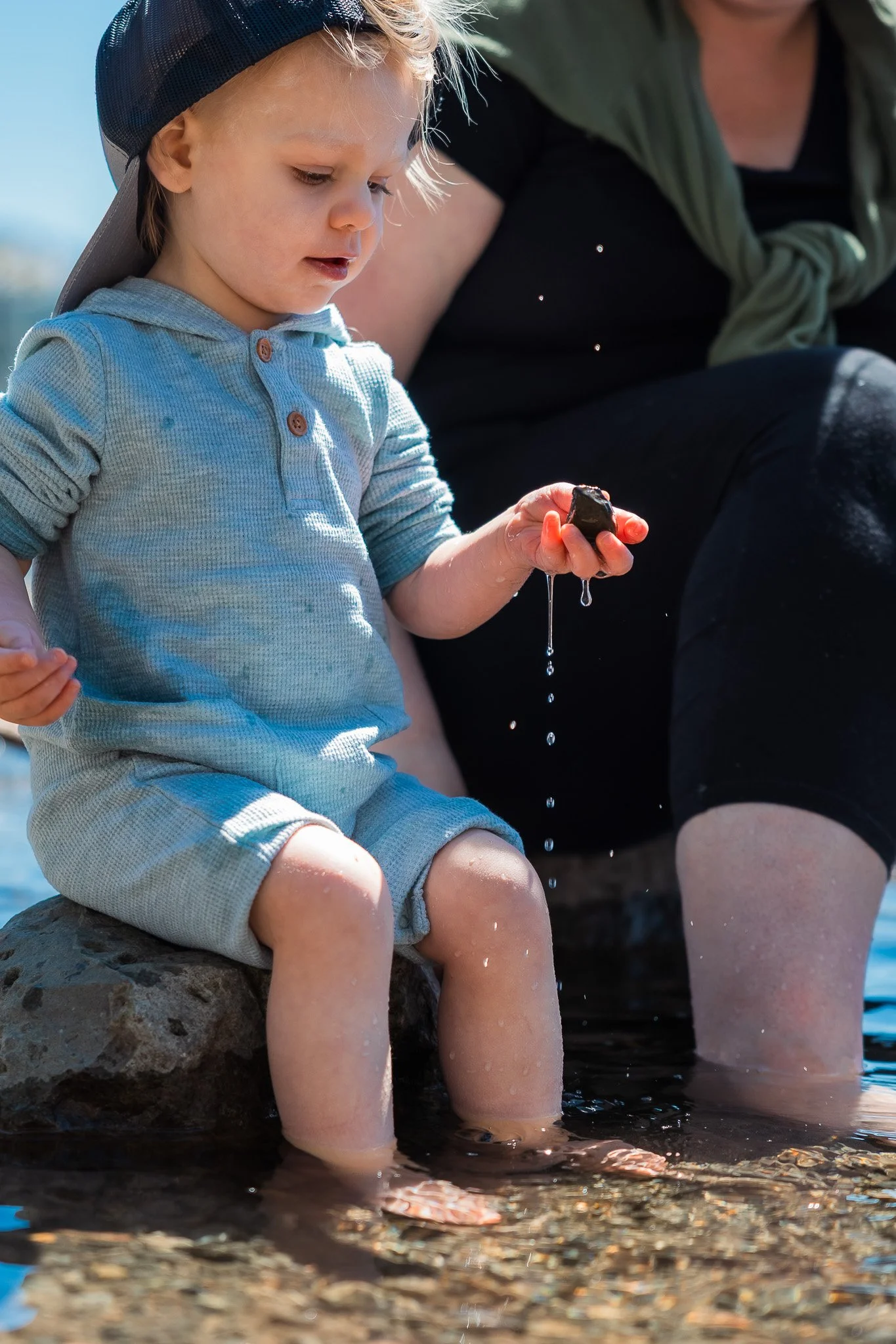 Toddler Holding Dripping Rock at Fallen Leaf Lake