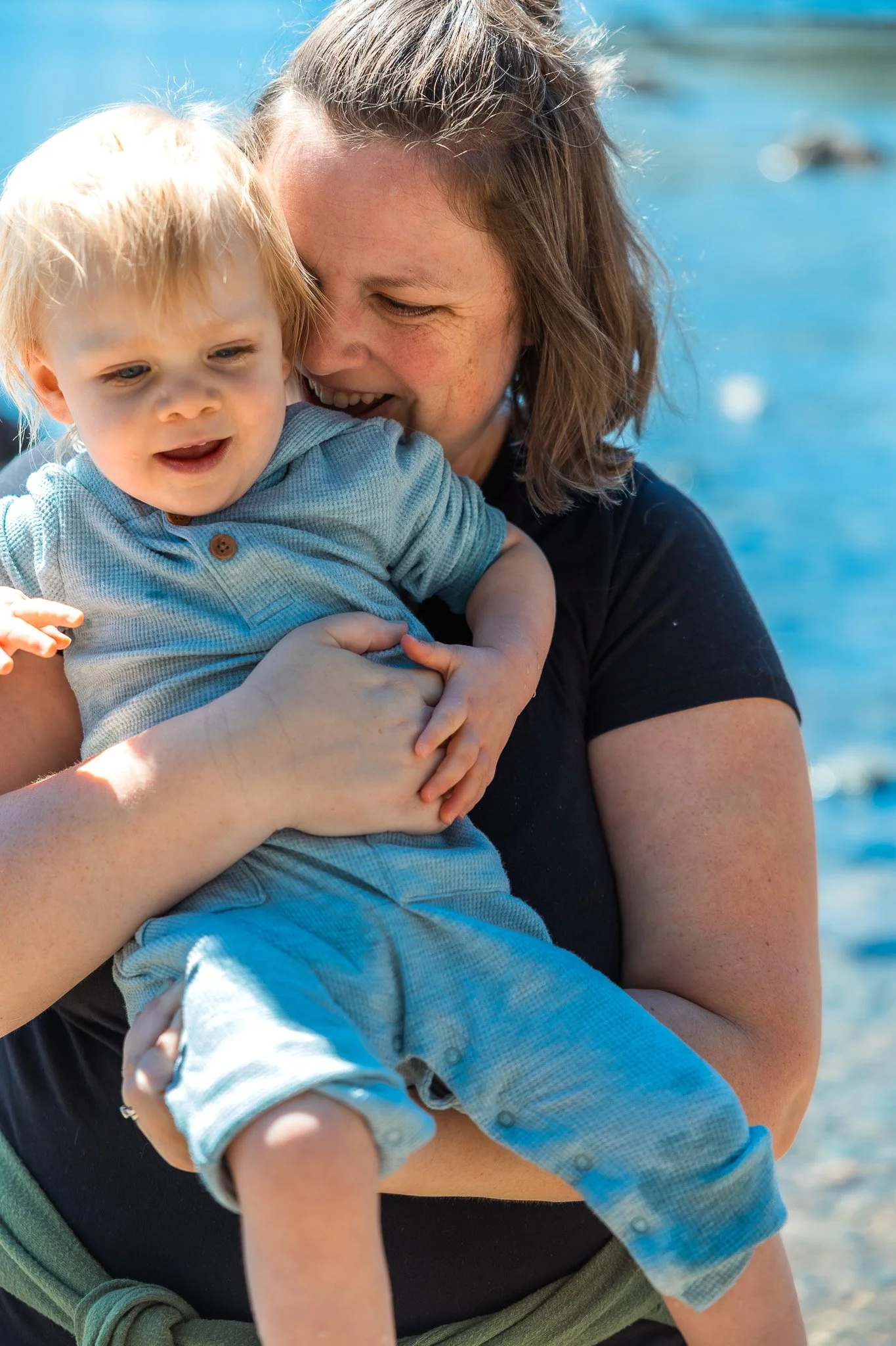 Mom Holding Toddler Close at Fallen Leaf Lake