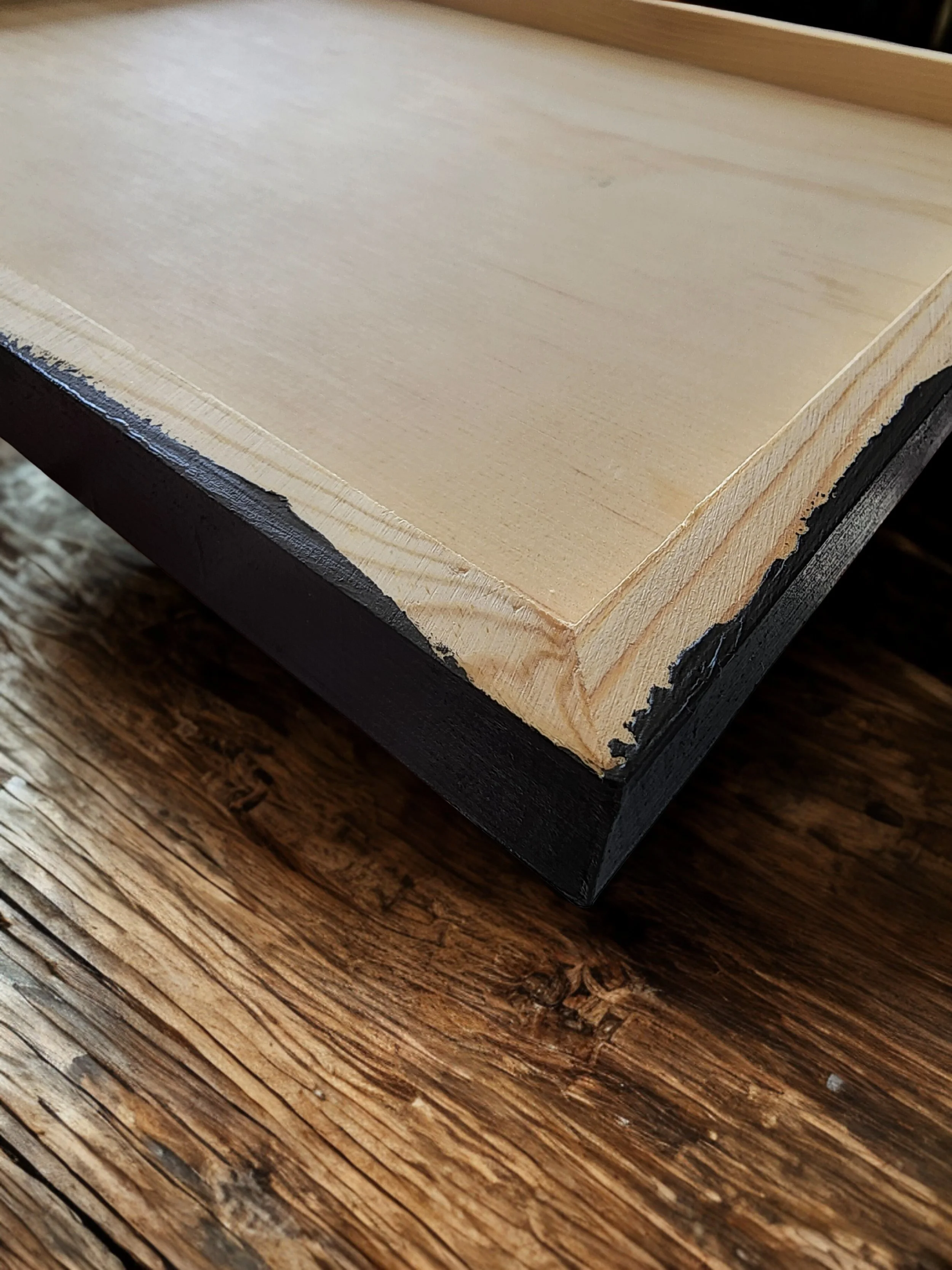 Contemporary acrylic painting on a cradled wood panel of a standing figure holding a teal shopping bag with paper bags covering their head, painted by Iowa artist Robin Werner. Titled Shopping Spree.