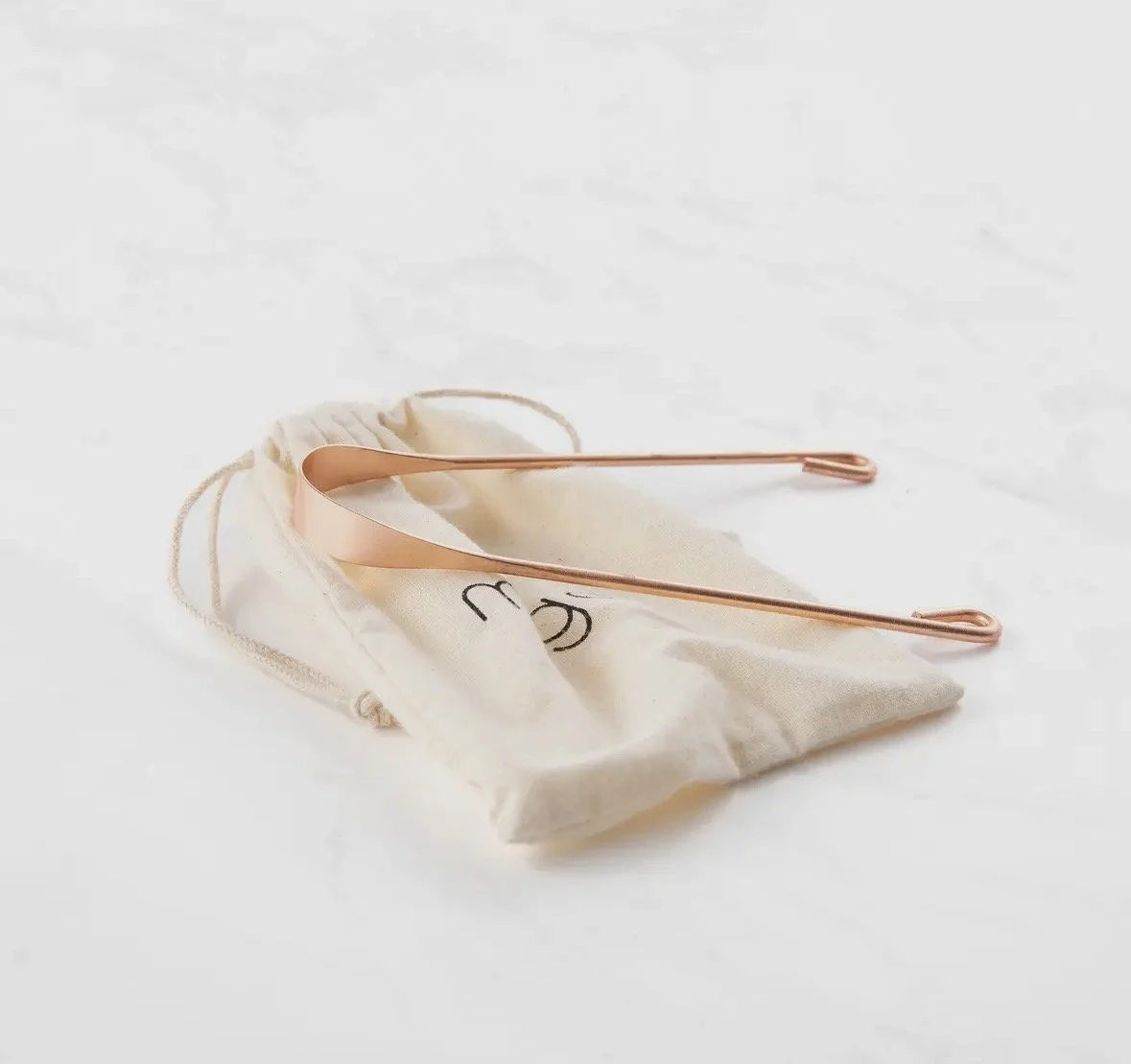 Copper tongue scraper