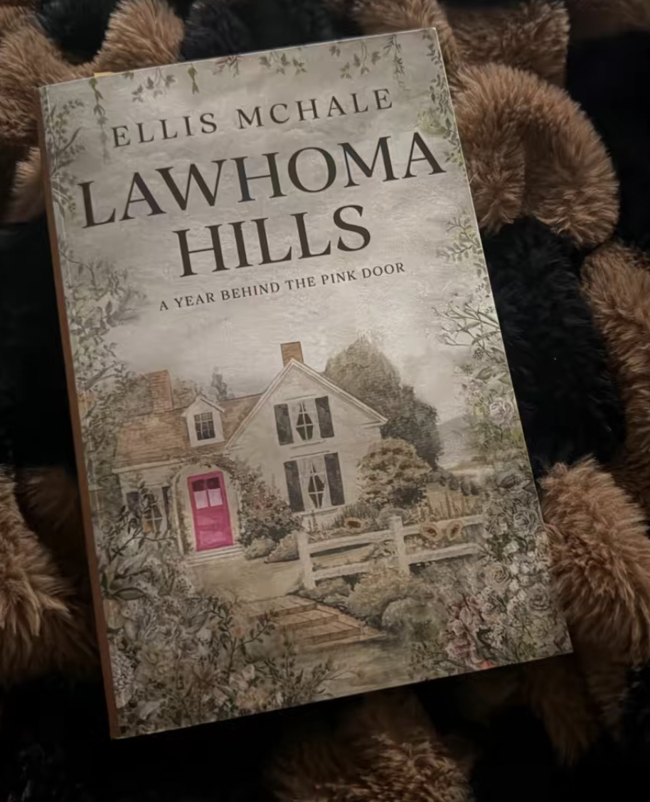 Book titled 'Lawhoma Hills' by Ellis McHale, with a cover illustration of a house with a pink door and garden, surrounded by trees and foliage.