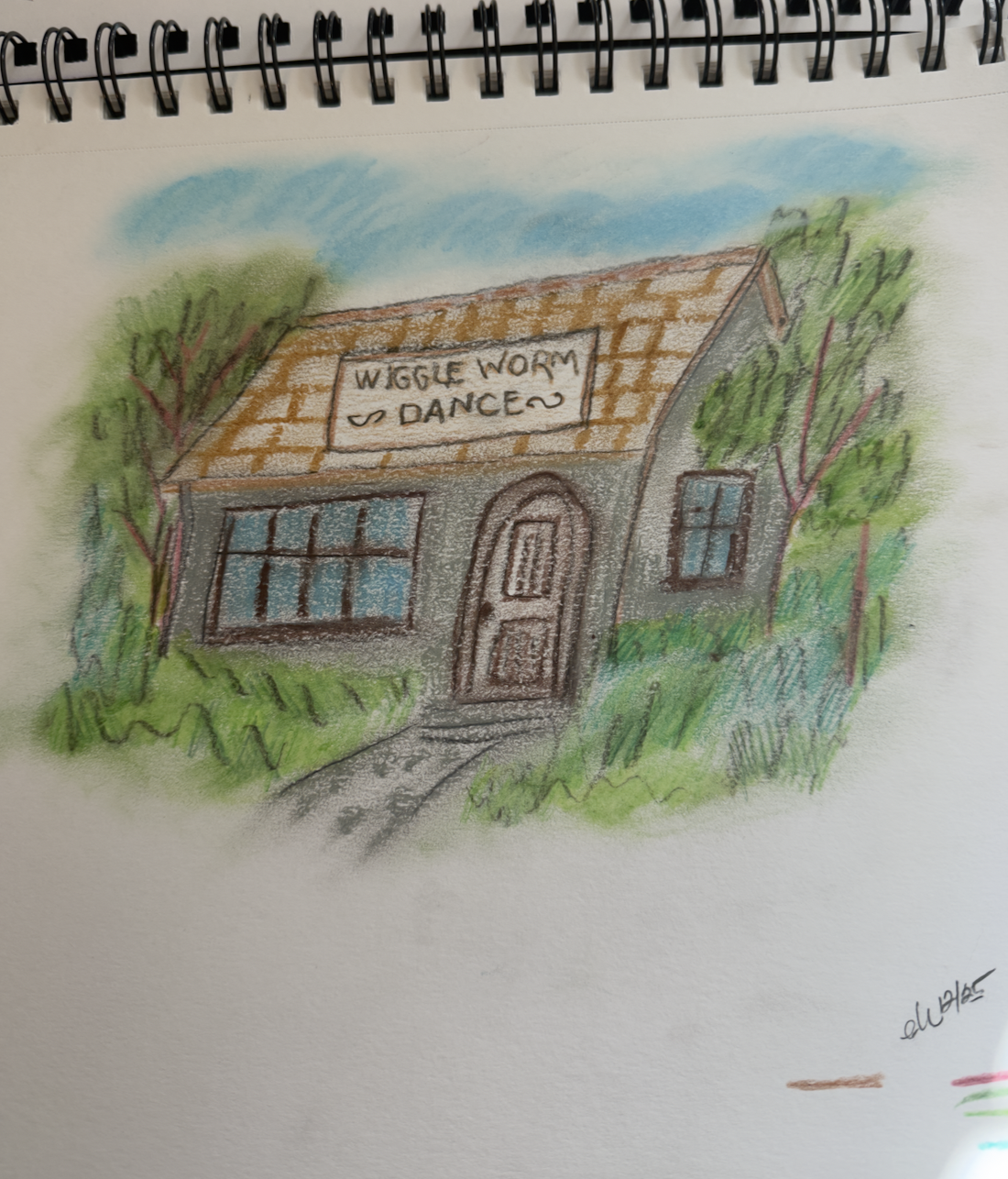 Colorful drawing of a house with a brown shingled roof, surrounded by green trees and bushes, with a blue sky in the background. There is a sign on the roof that reads 'WIGGLE WORM DANCE'.