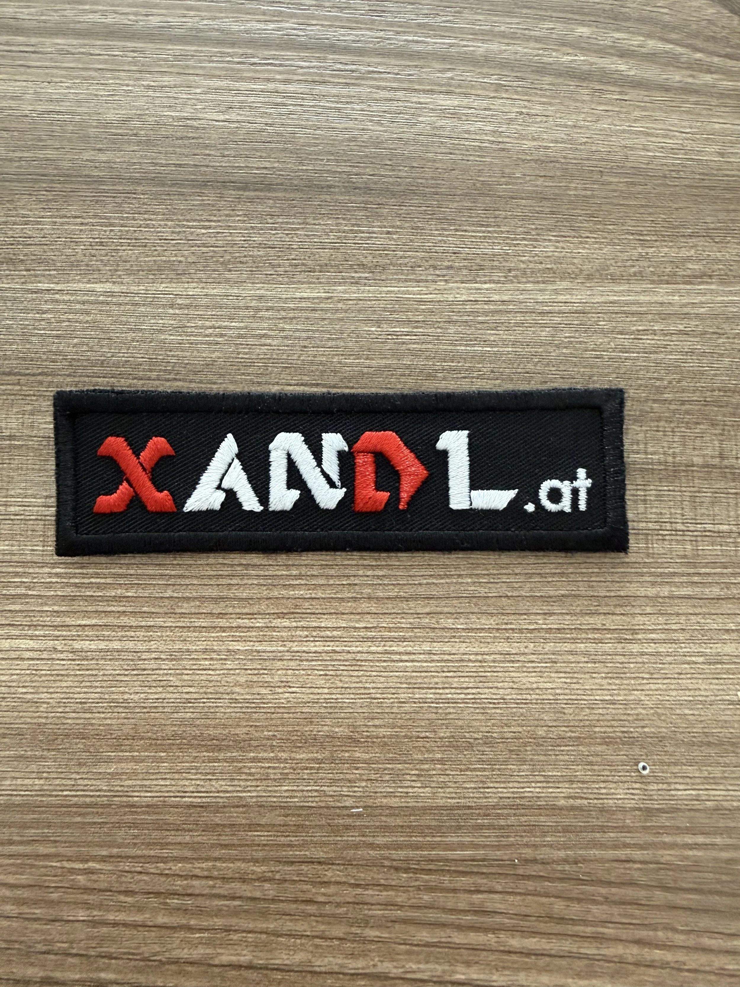 Xandl Aufnäher schwarz
