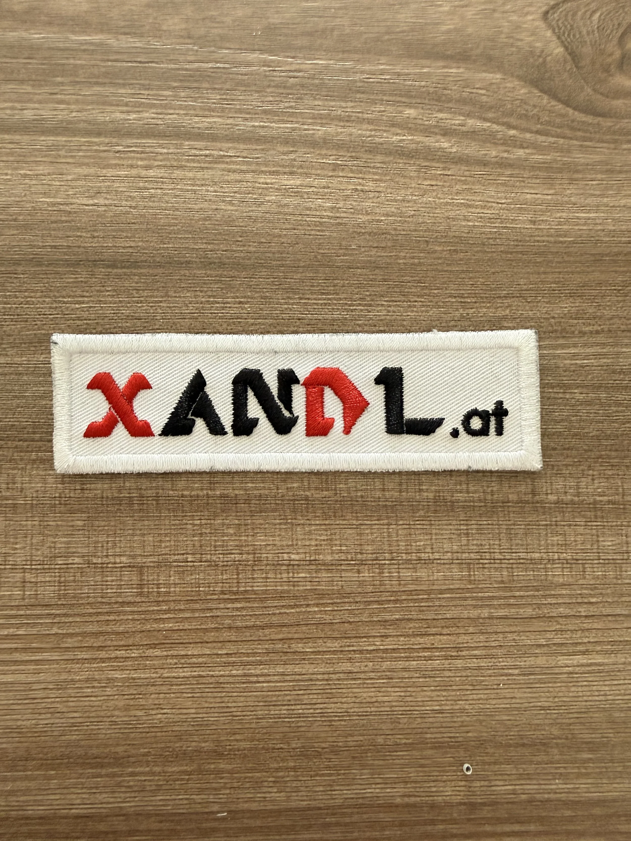 Xandl Aufnäher weiss