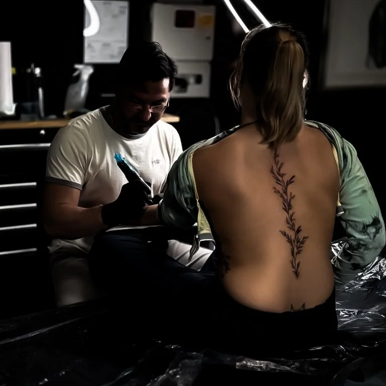 Tattoo consultation and custom tattoo design session at InkArt Tattoo Studio Miami