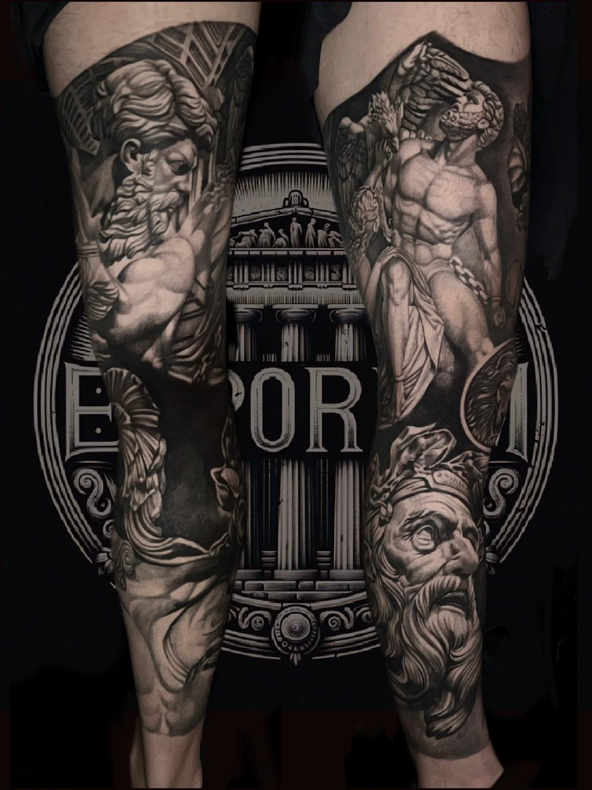 Black and grey realism statue sleeve tattoo by InkArt Tattoos in Miami Florida