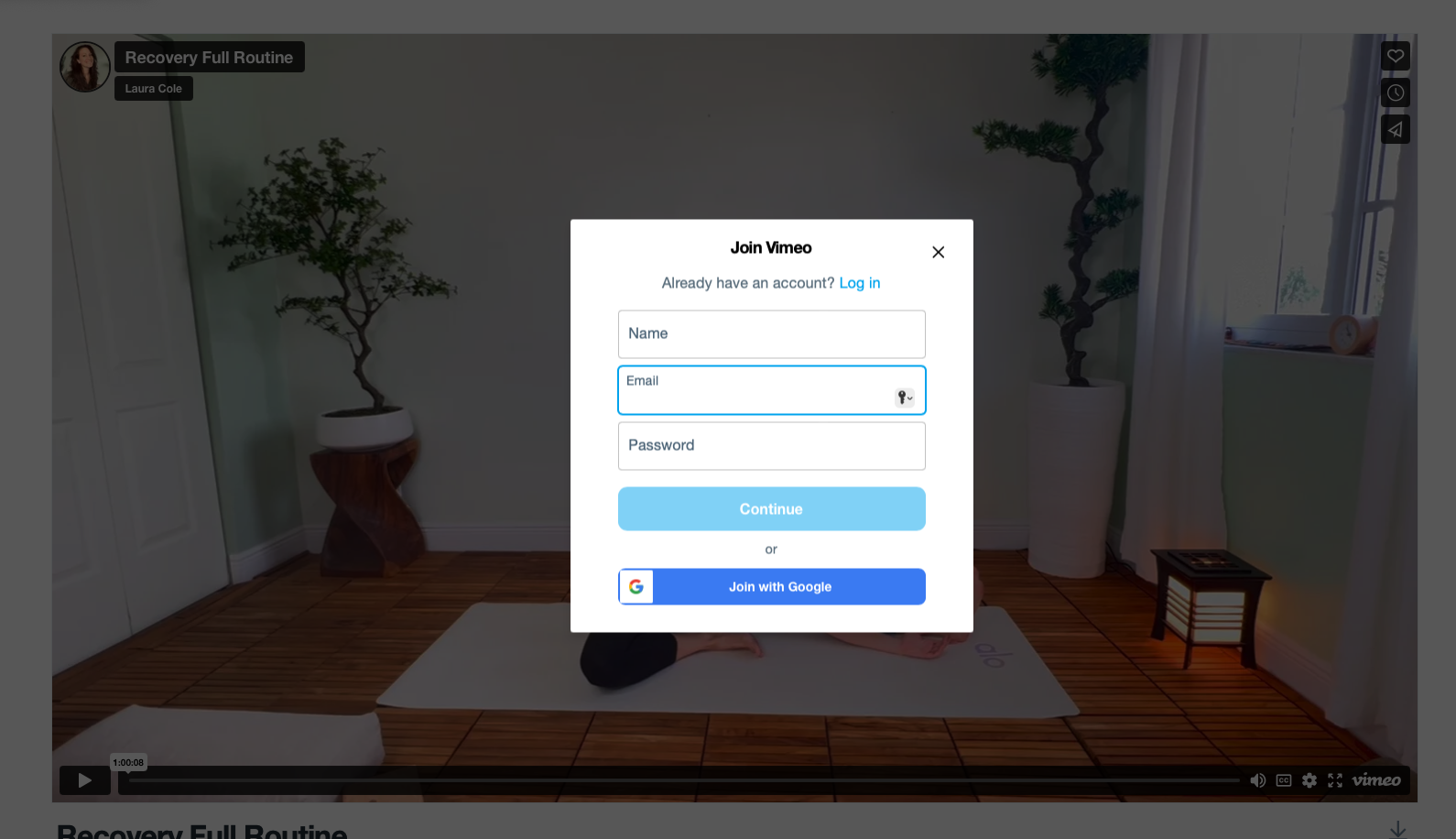 Vimeo login pop-up overlaying a yoga studio with potted plants, curtains, and a wooden floor.