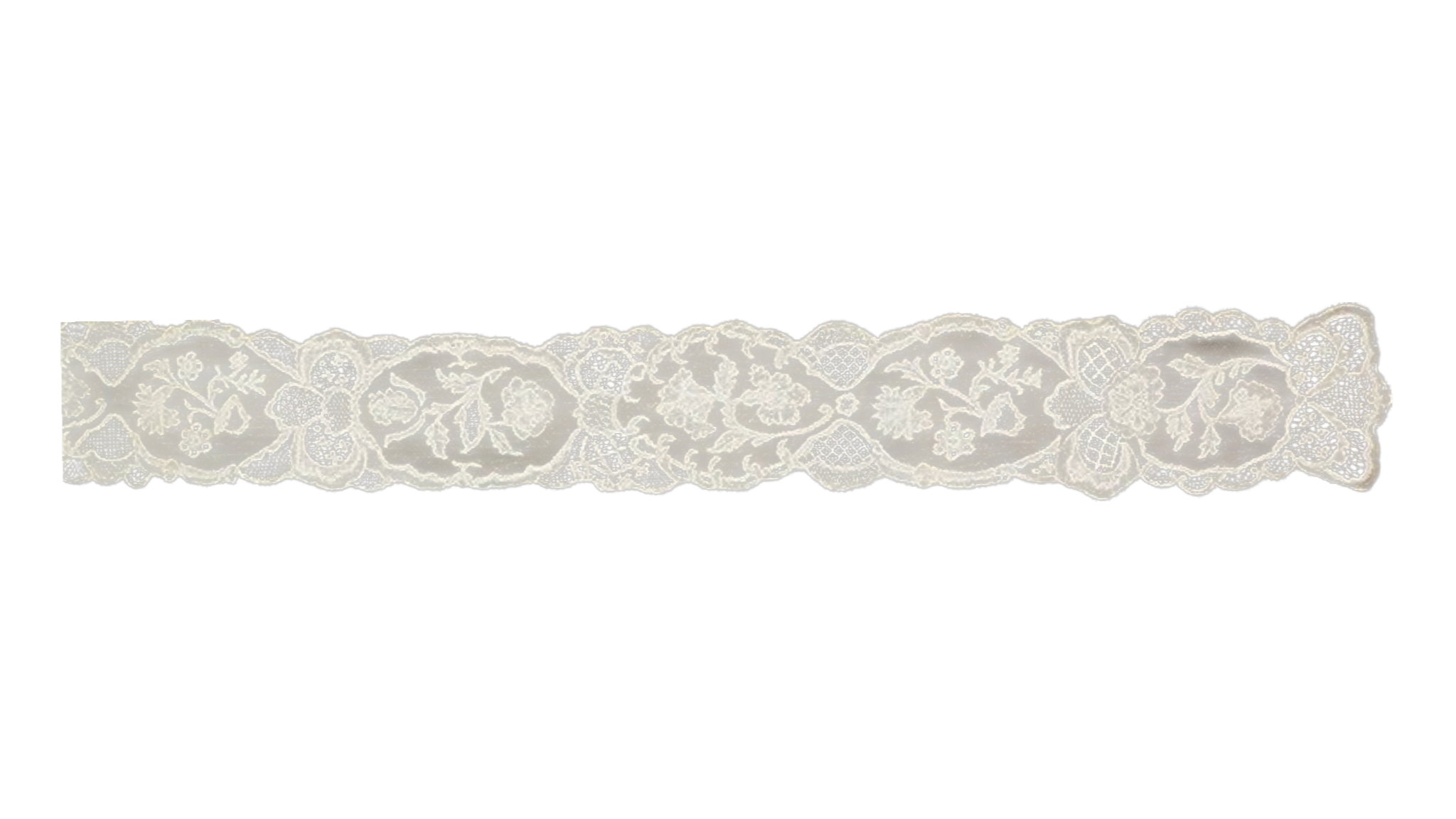 A white lace trim with floral and geometric patterns laid out on a black background.