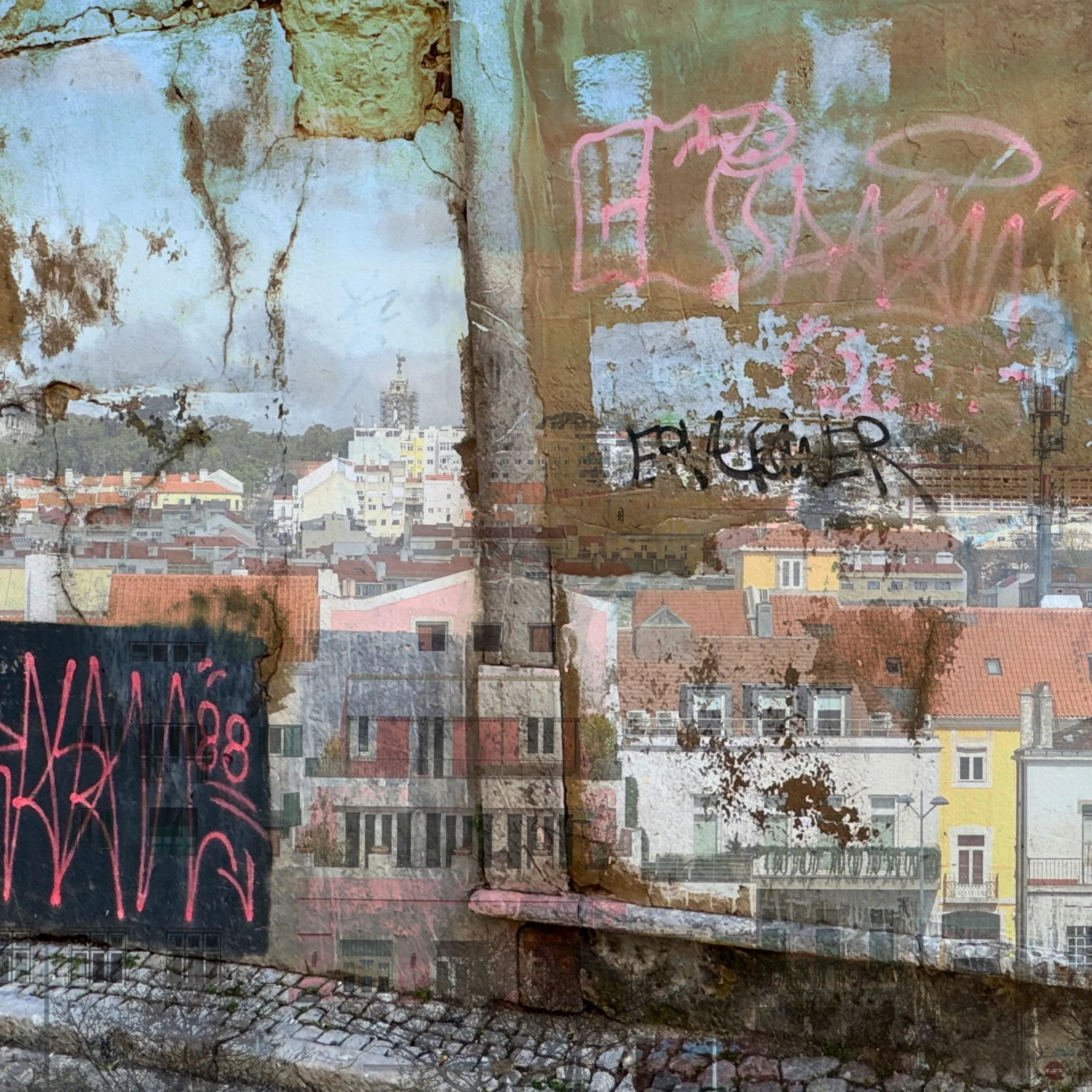 Urban cityscape image layered with graffiti-covered wall with peeling paint and cracks. The city has colorful buildings with red tile roofs and a tall structure in the background, possibly a church or clock tower.
