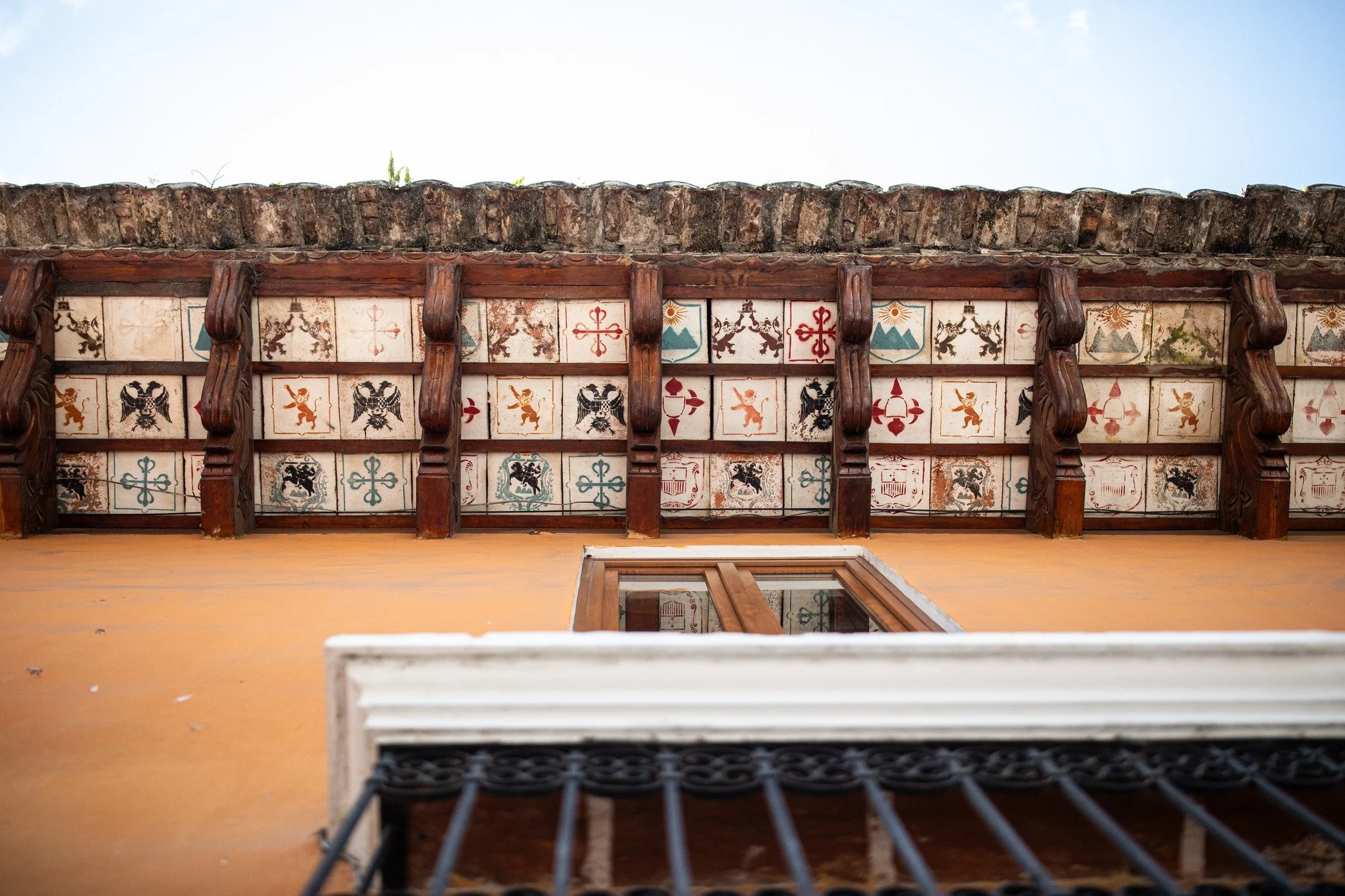 Walking in Antigua can be an adventure - from narrow sidewalks (which are, thankfully, being widened) to concrete window boxes - you have to be watch where you're going!

But if you go slowly and carefully, you might have the time to look up. You nev