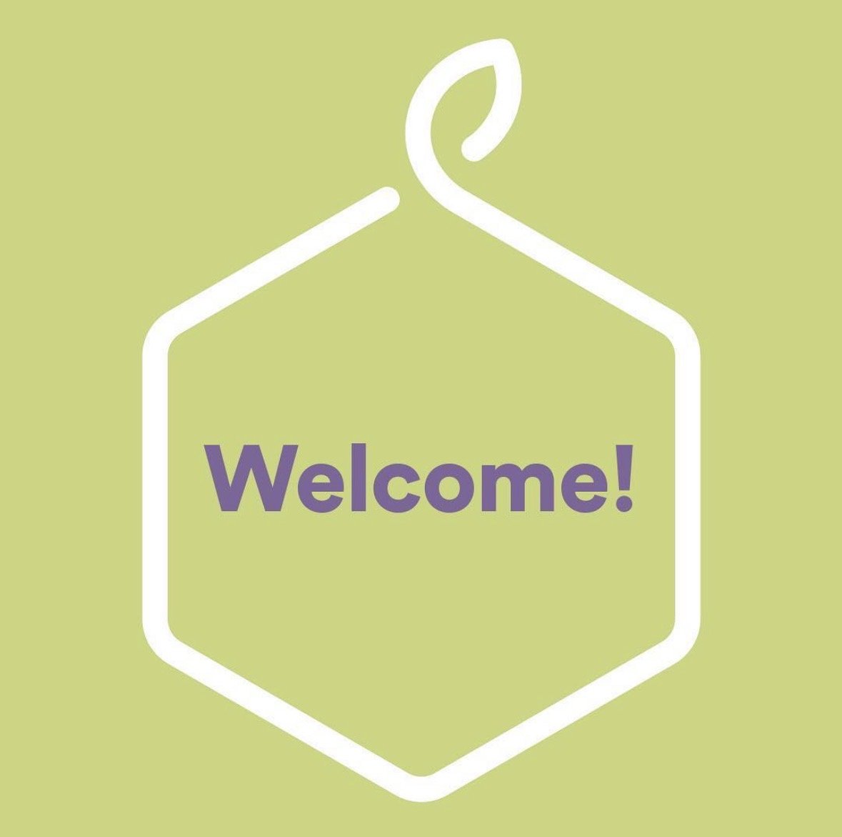 A light green background with a white outline of a hexagonal hanger shape and the word "Welcome!" in purple inside the shape.